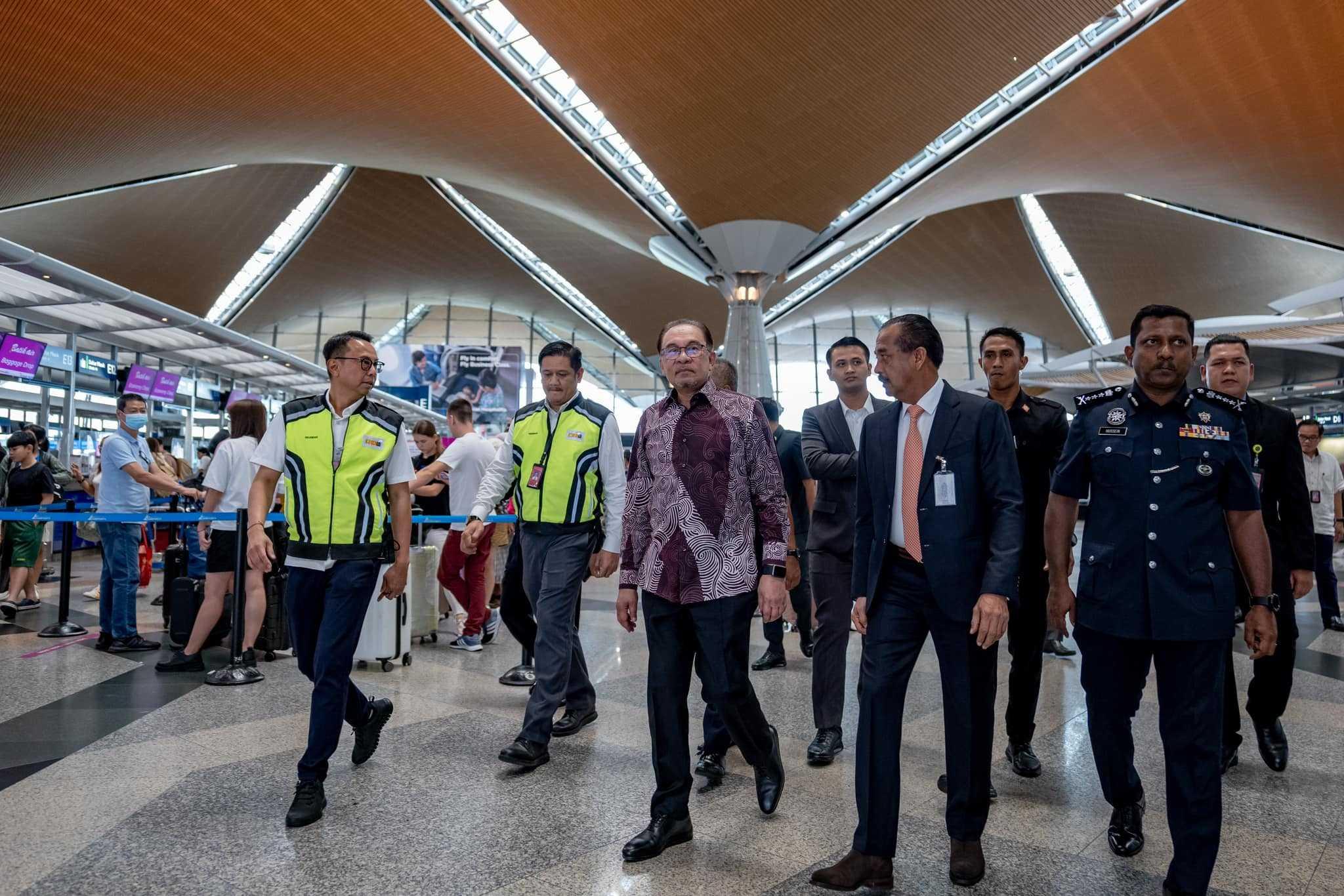 Prime Minister Anwar Ibrahim during a surprise visit at KLIA in Sepang, July 2. Photo: Facebook