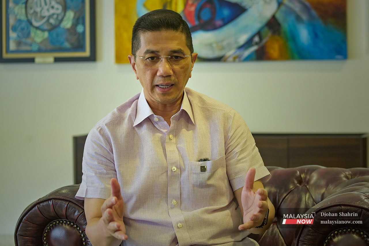 Former economic affairs minister Mohamed Azmin Ali speaks in an interview with MalaysiaNow in Bangsar. 
