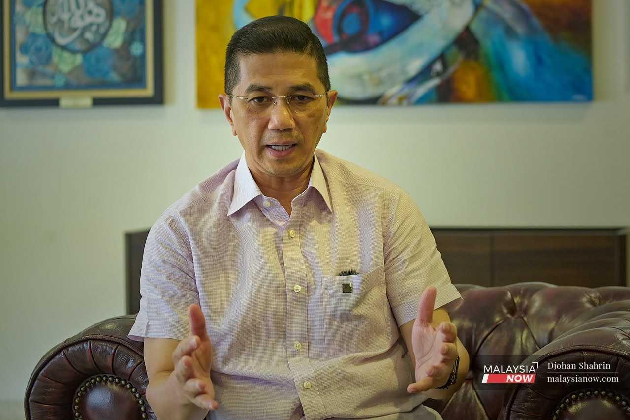 Former economic affairs minister Mohamed Azmin Ali speaks in an interview with MalaysiaNow in Bangsar.