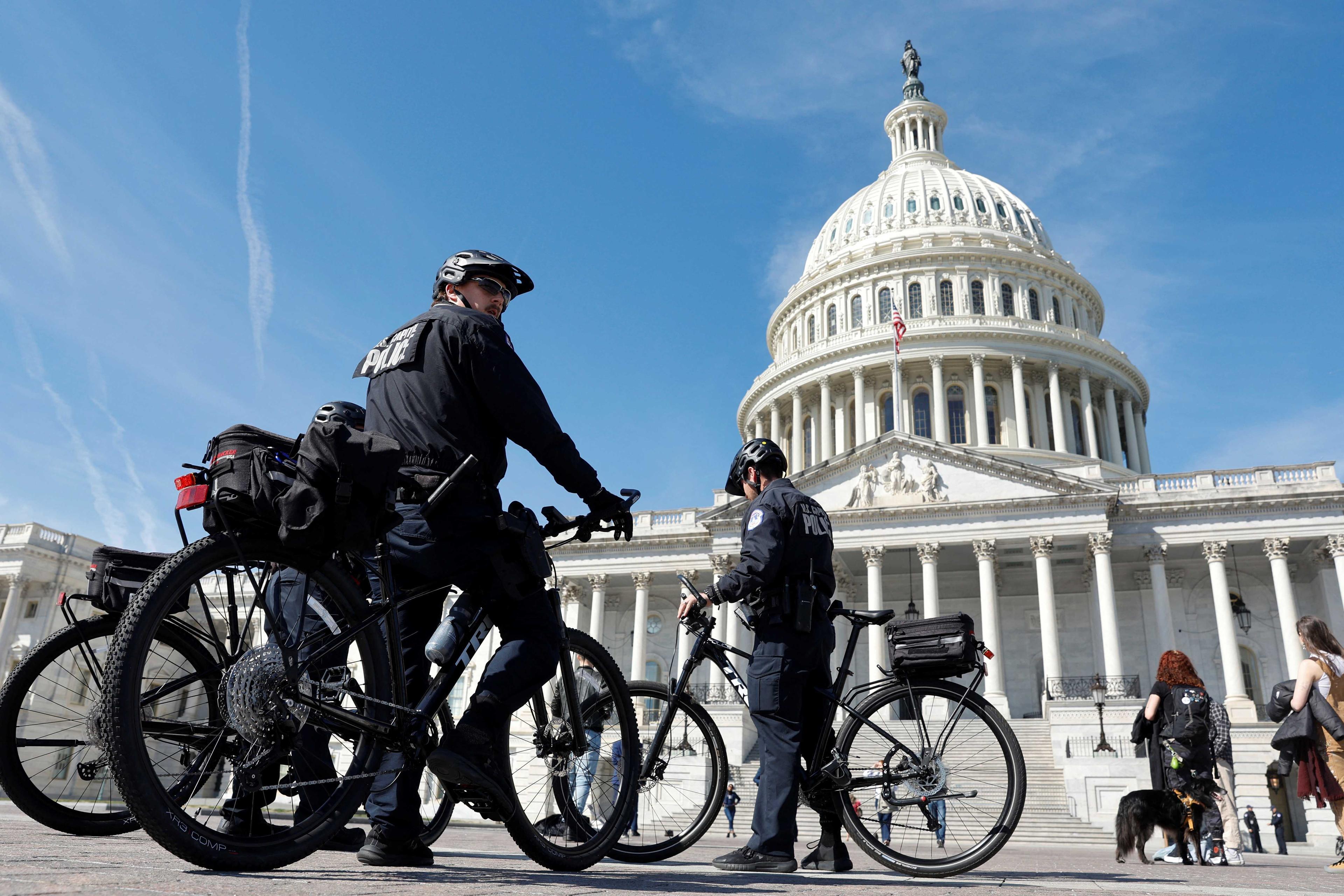 US Capitol Police officers patrol on bicycles, at the US Capitol in Washington, US March 21. Photo: Reuters
