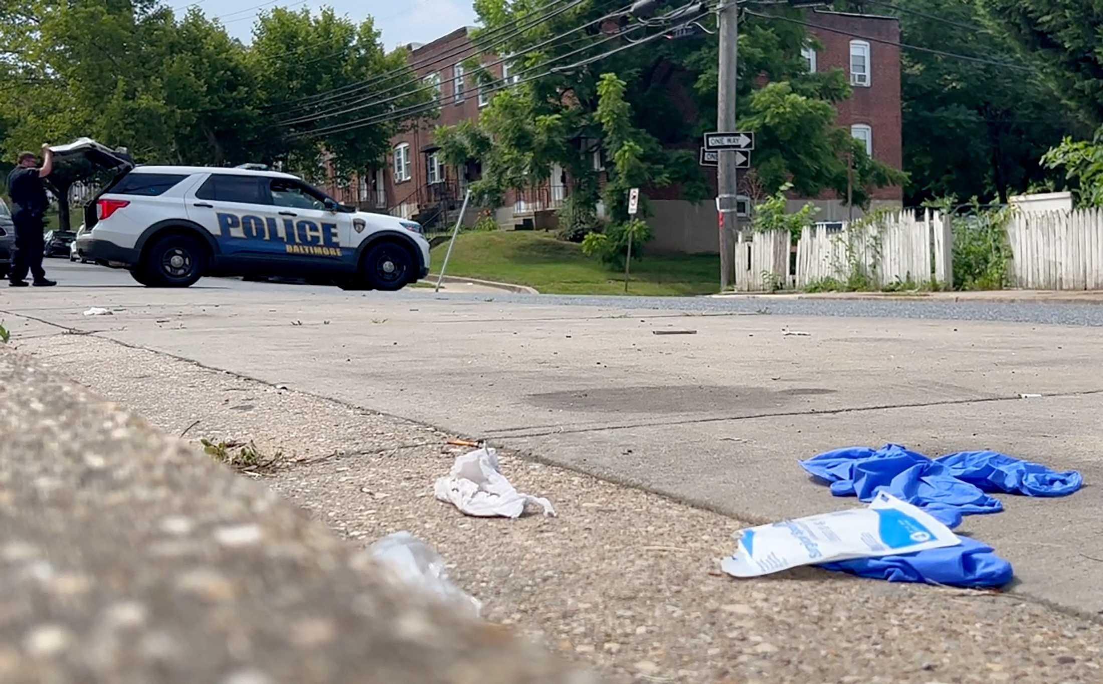 Police investigate after a mass shooting at the scene of a Fourth of July holiday weekend block party in Baltimore, Maryland, US July 2. Photo: Reuters