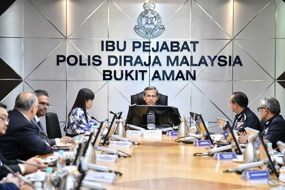 Communications and Digital Minister Fahmi Fadzil attends a meeting at the Bukit Aman police headquarters in Kuala Lumpur, July 4. Photo: Facebook