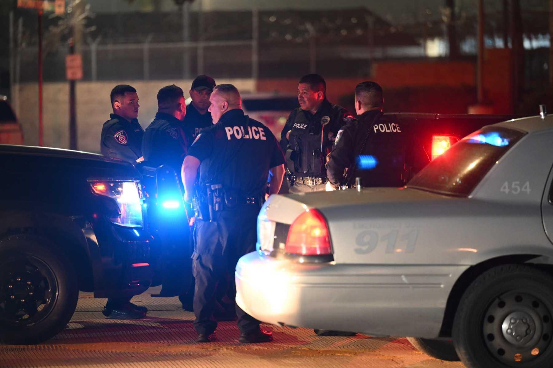 Police officers stand guard at the US-Mexico border on May 11, in Brownsville, Texas. Photo: AFP