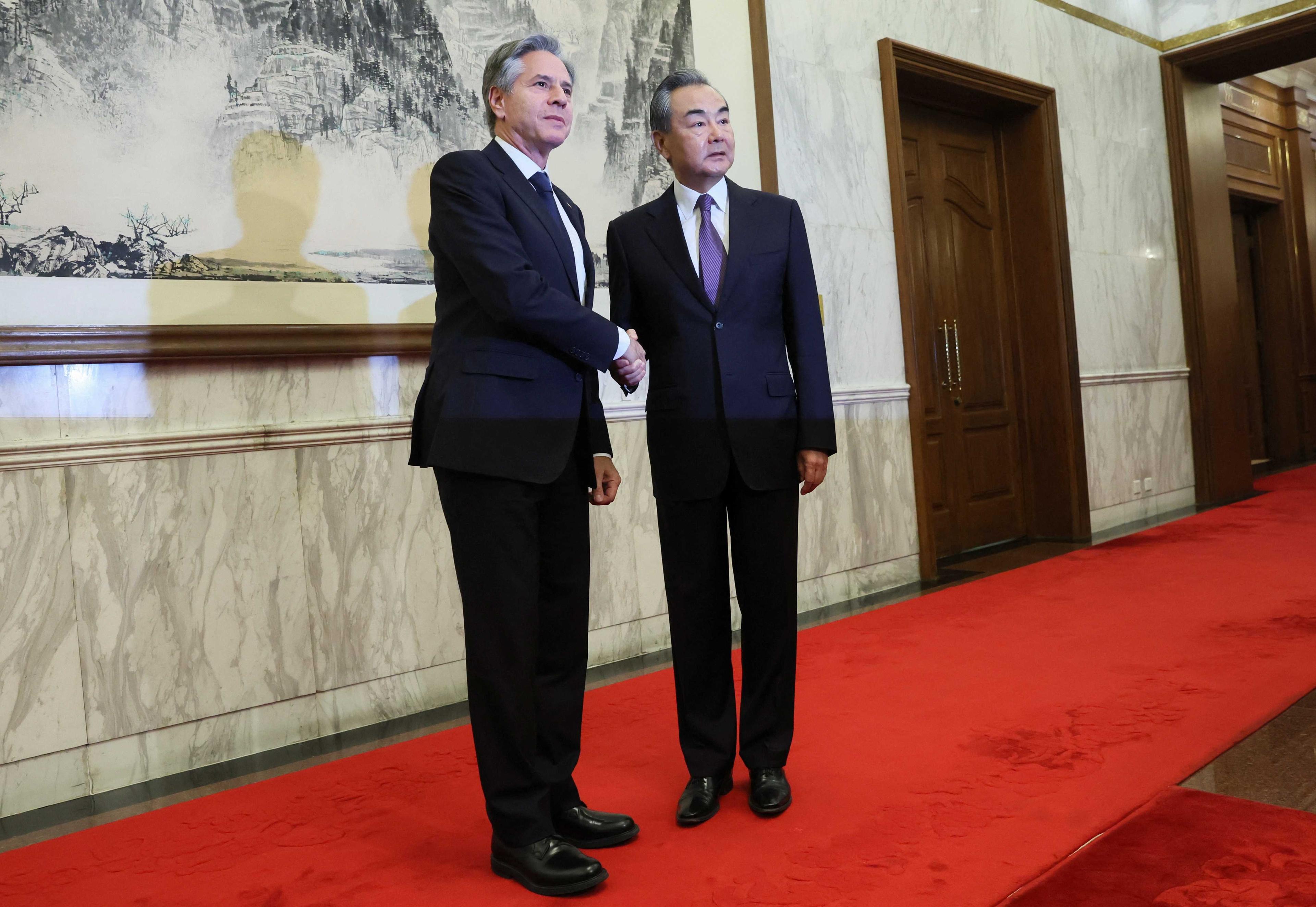 US Secretary of State Antony Blinken shakes hands with China's Director of the Office of the Central Foreign Affairs Commission Wang Yi at the Diaoyutai State Guesthouse in Beijing, China, June 19. Photo: Reuters
