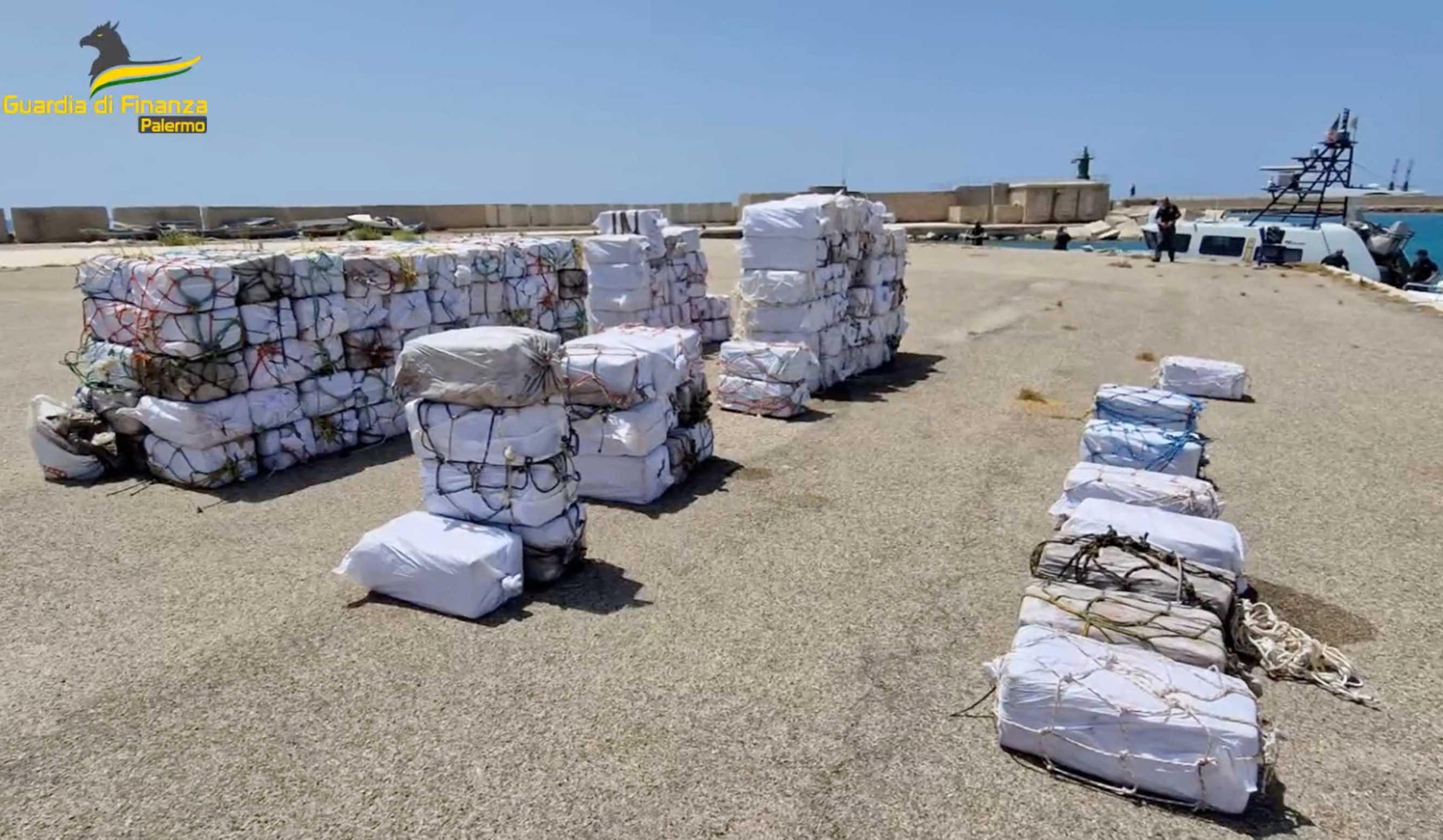 Packages containing cocaine seized during a police operation, lie on a dock in the harbour of Porto Empedocle, Italy July 21. Photo: Reuters