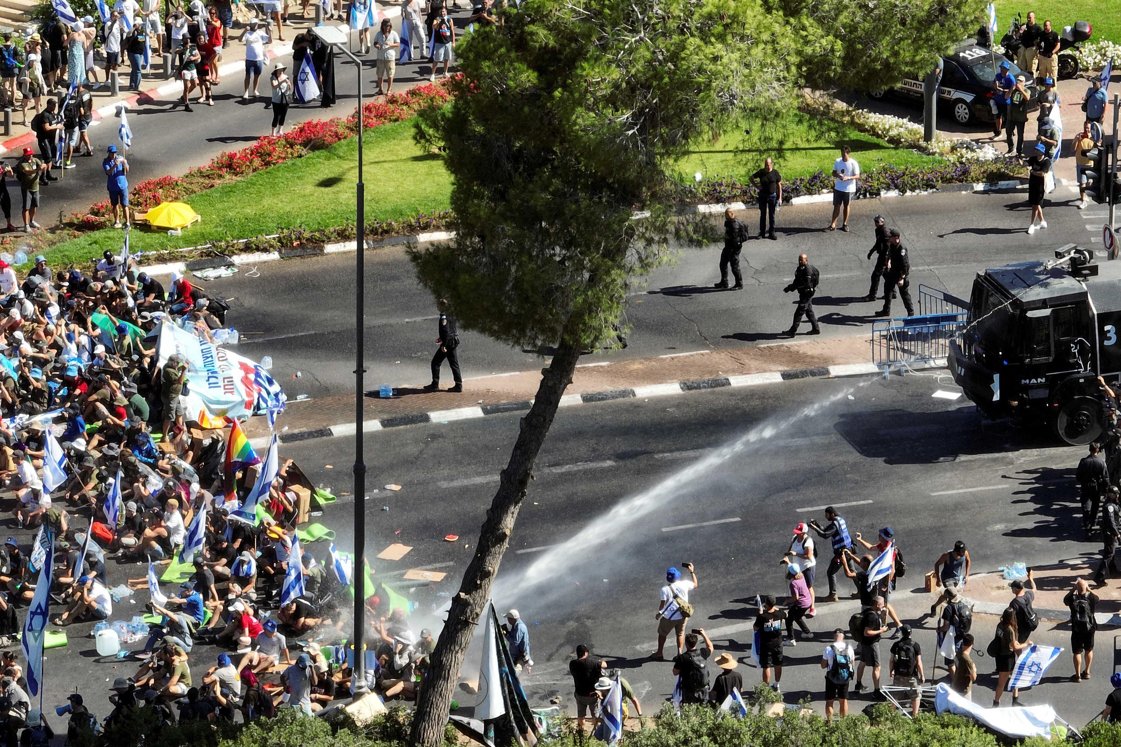 An aerial view shows police using a water cannon during a demonstration against Israeli Prime Minister Benjamin Netanyahu and his nationalist coalition government's judicial overhaul in Jerusalem July 24. Photo: Reuters