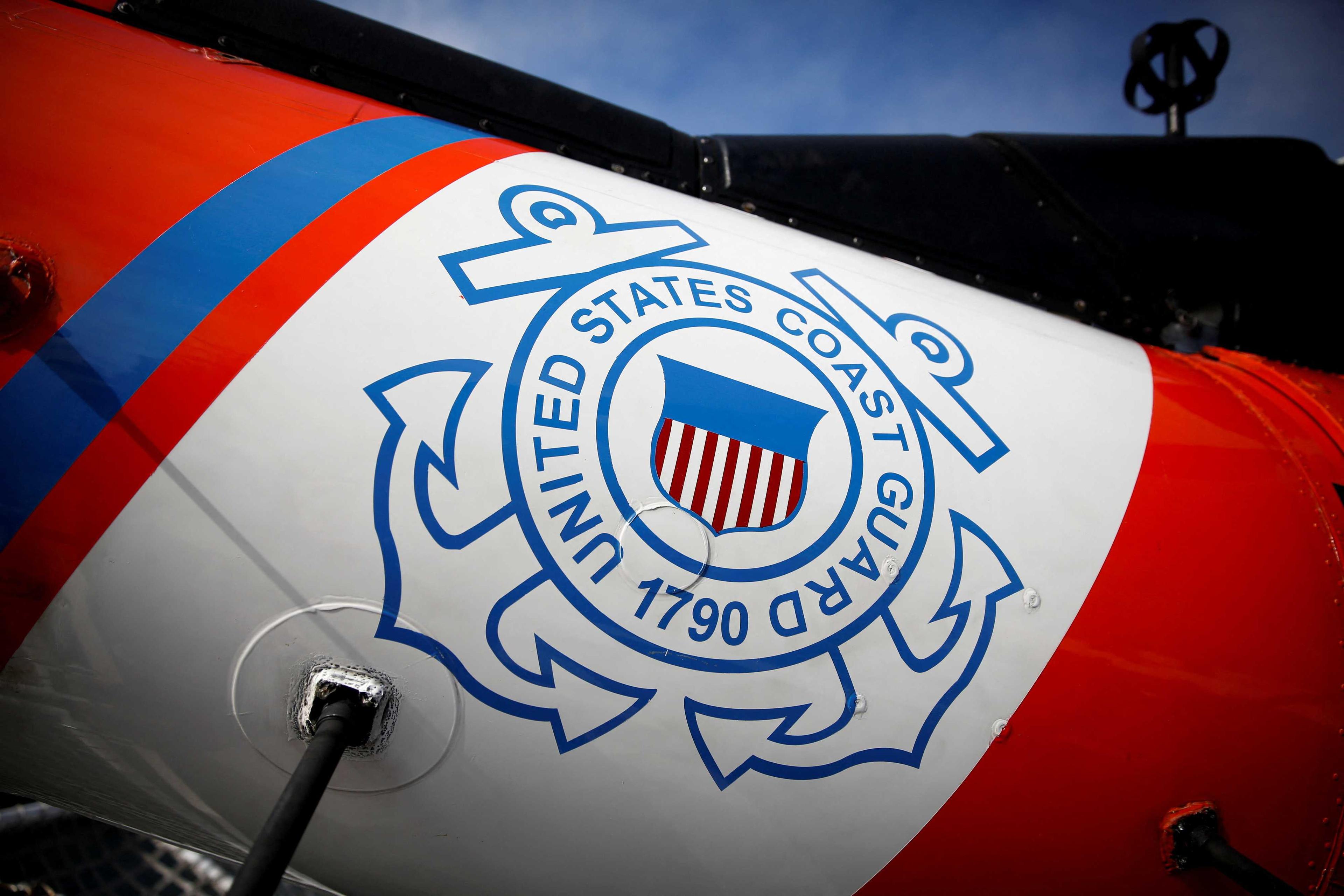 The US Coast Guard's logo is seen on an helicopter on the deck of the Coast Guard Cutter Hamilton at Port Everglades, in Fort Lauderdale, Florida, US Nov 22, 2021. Photo: Reuters