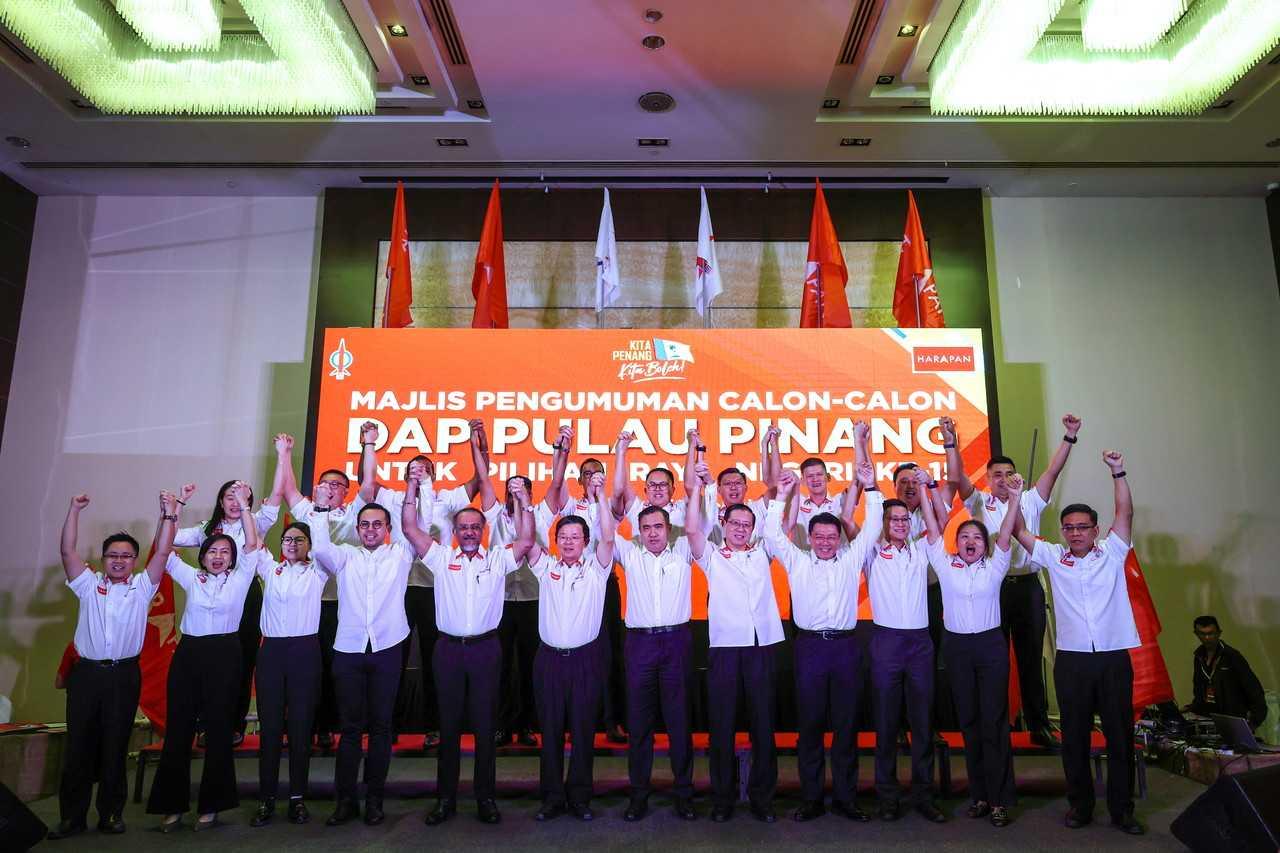 DAP secretary-general Anthony Loke (front, centre) with the party's candidates for the Penang election in George Town, July 25. Photo: Bernama