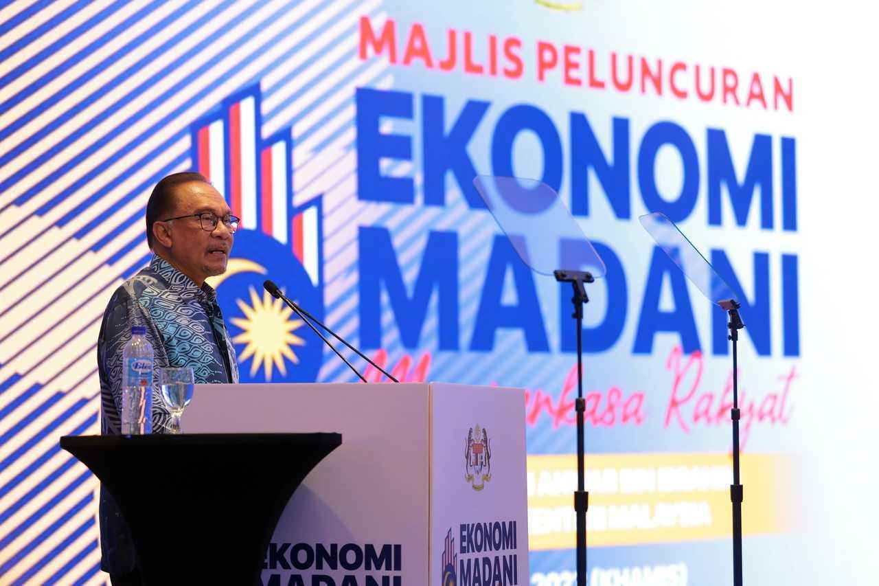 Prime Minister Anwar Ibrahim speaks at the launch of 'Madani Economy: Empowering the People' in Kuala Lumpur, July 27. Photo: Bernama
