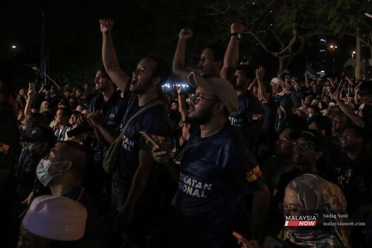 The crowd responds during Perikatan Nasional's announcement of candidates for the upcoming state elections in Taman Medan, Petaling Jaya, July 26.