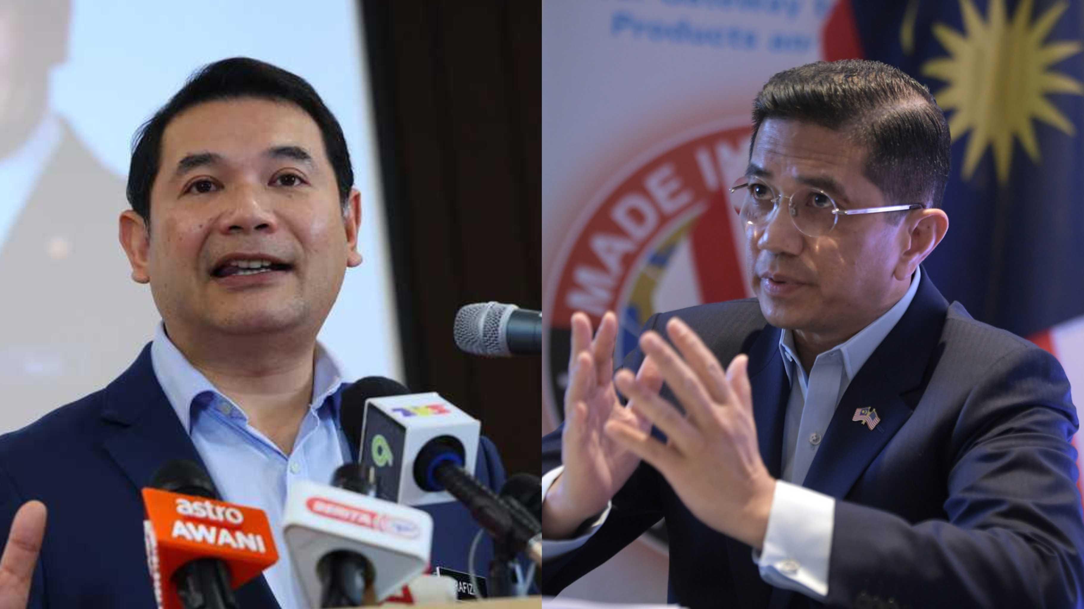Pengerusi Perikatan Nasional Selangor Mohamed Azmin Ali (kanan) dan Menteri Ekonomi Rafizi Ramli.