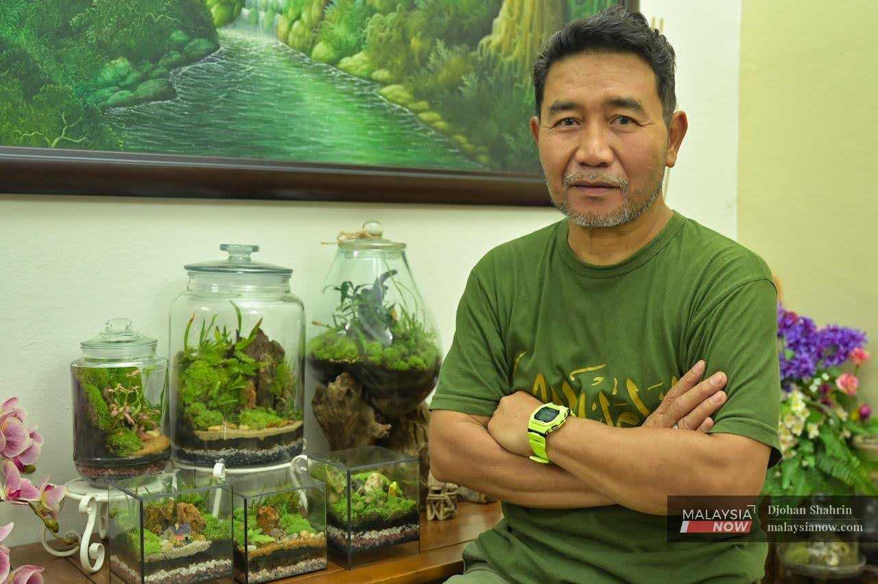 Abdul Aziz Majid sells moss used for decorating live plants in glass containers, which has become his source of income since retiring.