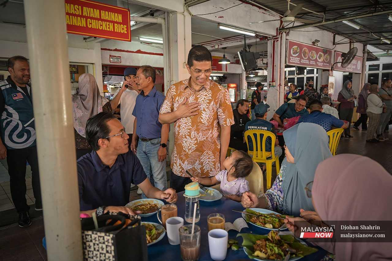 Azmin goes from place to place in Hulu Kelang, greeting as many voters as he can before the election.  