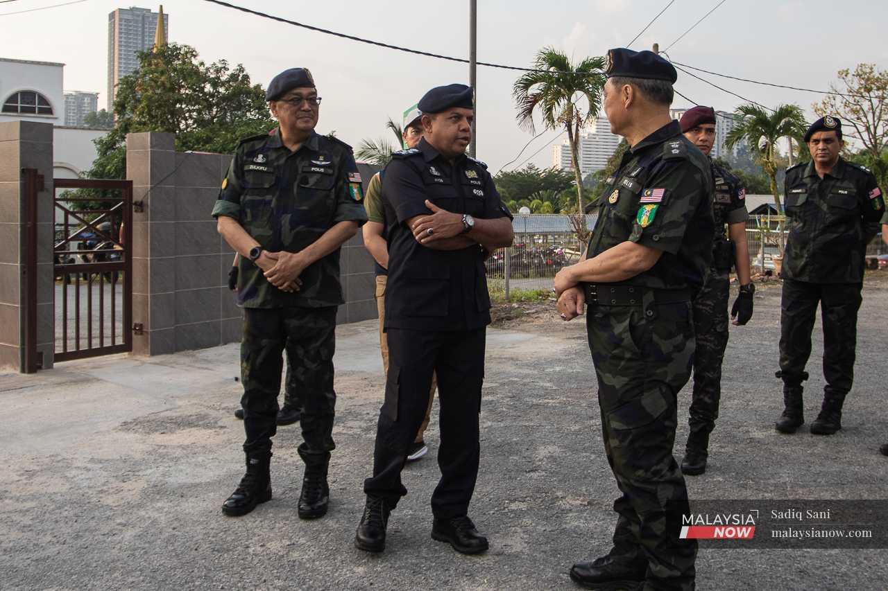Deputy Inspector-General of Police Ayob Khan Mydin Pitchay visits the Markas Briged Tengah Pasukan Gerakan Am early voting centre in Cheras.