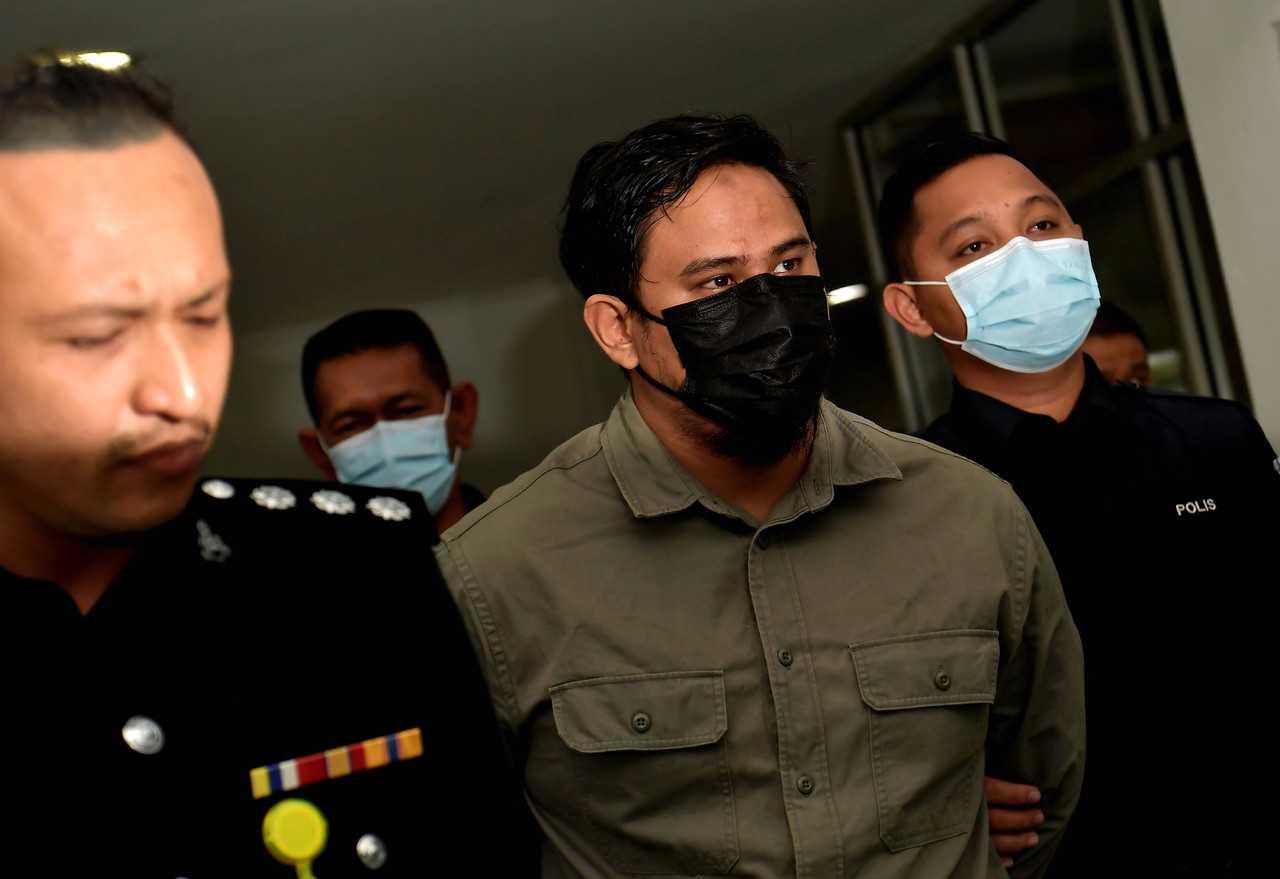 Mohamad Safiq Rosli claimed trial today for stalking a famous photographer. Photo: Bernama