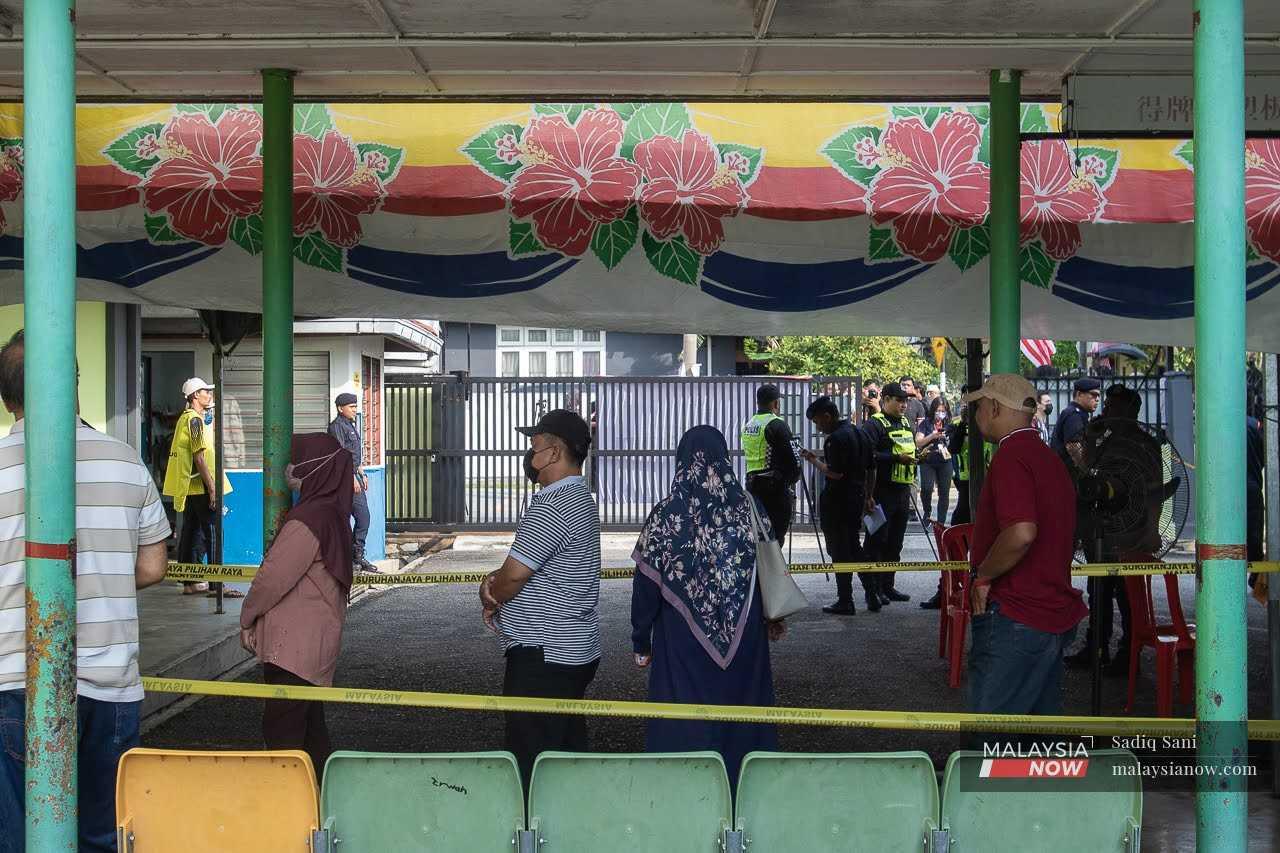 Voters queue at a polling centre in Klang, Selangor.