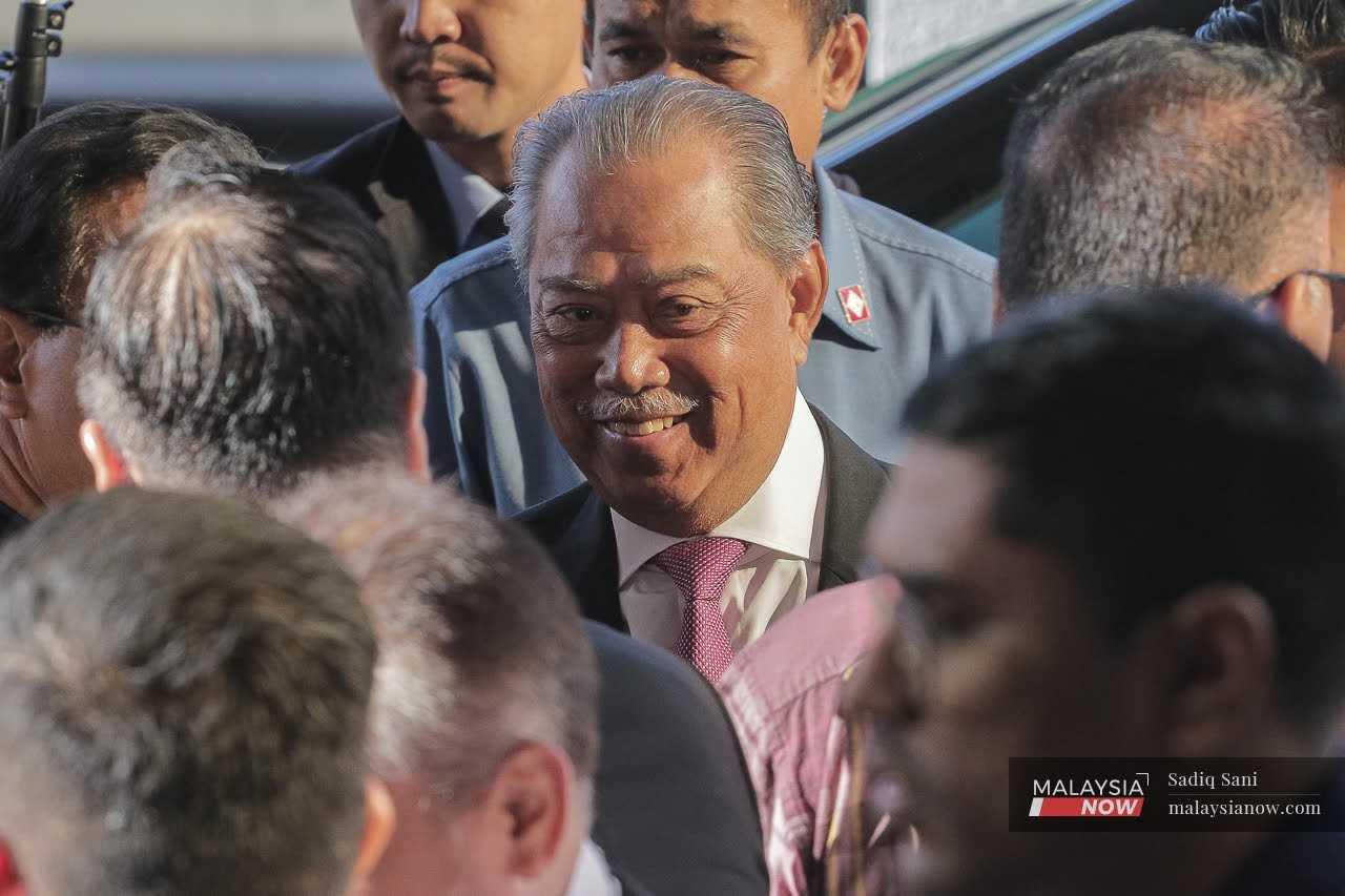 Former prime minister Muhyiddin Yassin at the Kuala Lumpur court complex, Aug 15.