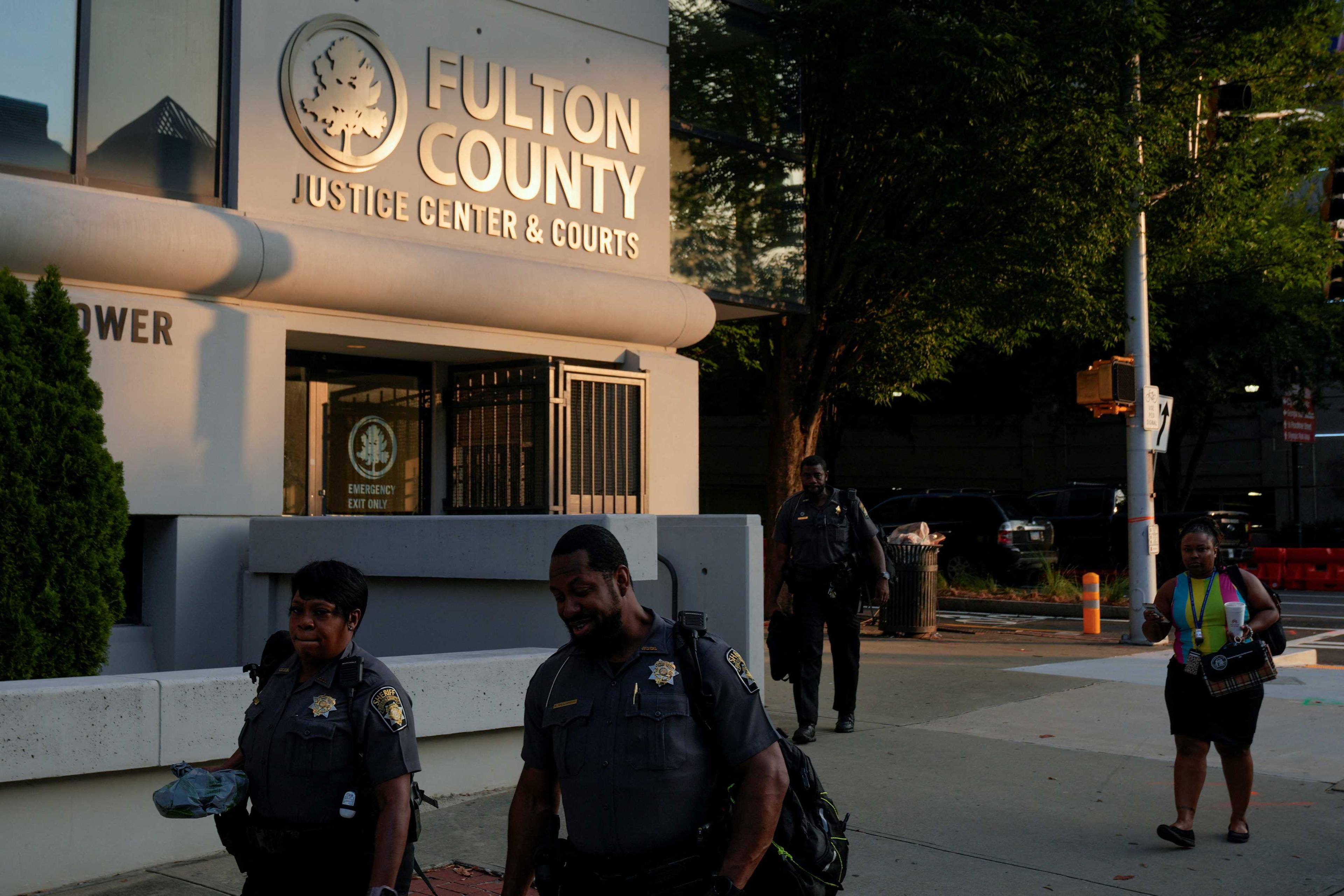 People walk past the Lewis R Slaton Courthouse in Atlanta, Georgia, US Aug 15. Photo: Reuters