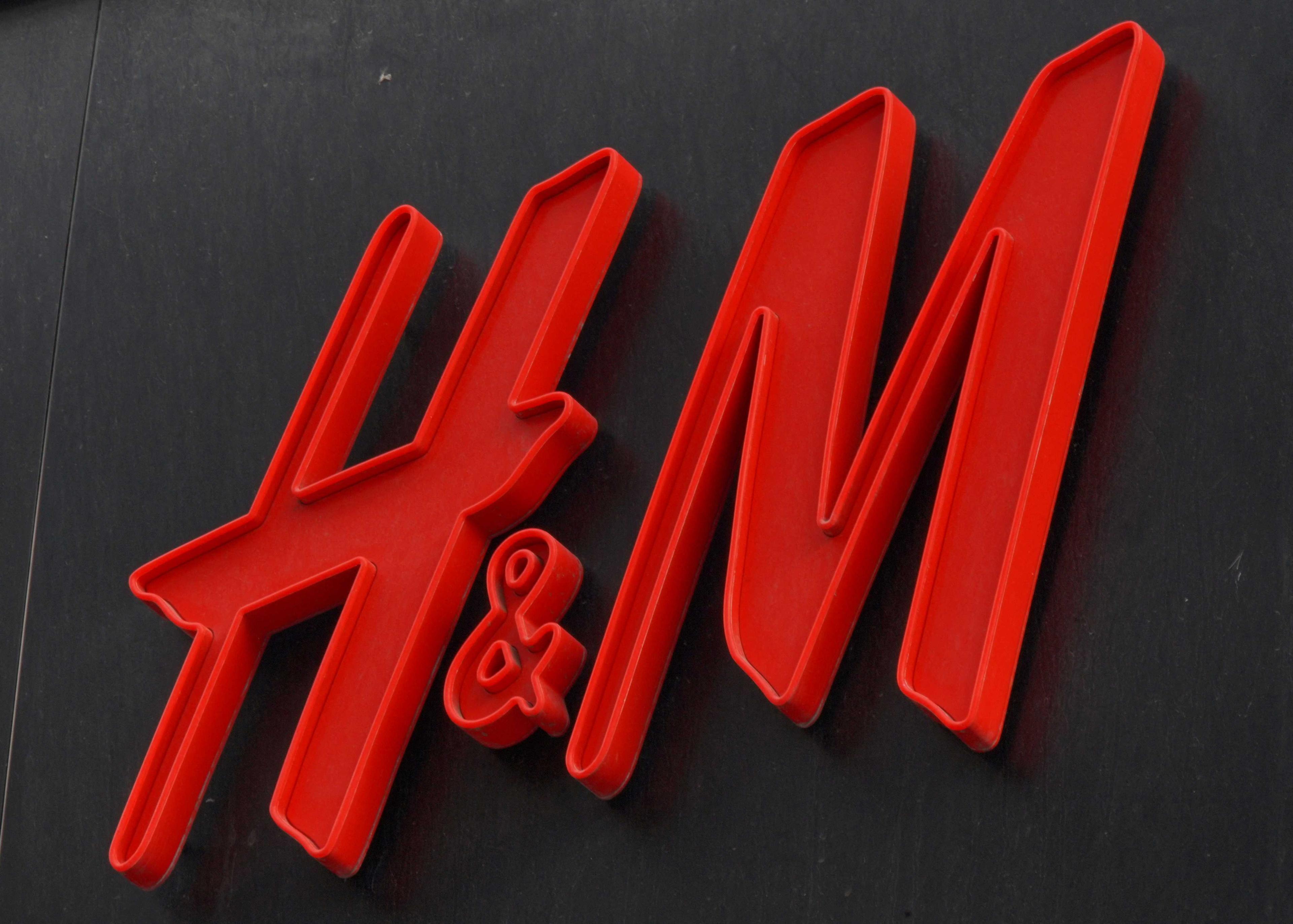 The logo of fashion retailer H&M is on display outside a store in Stockholm, Sweden, July 17. Photo: Reuters