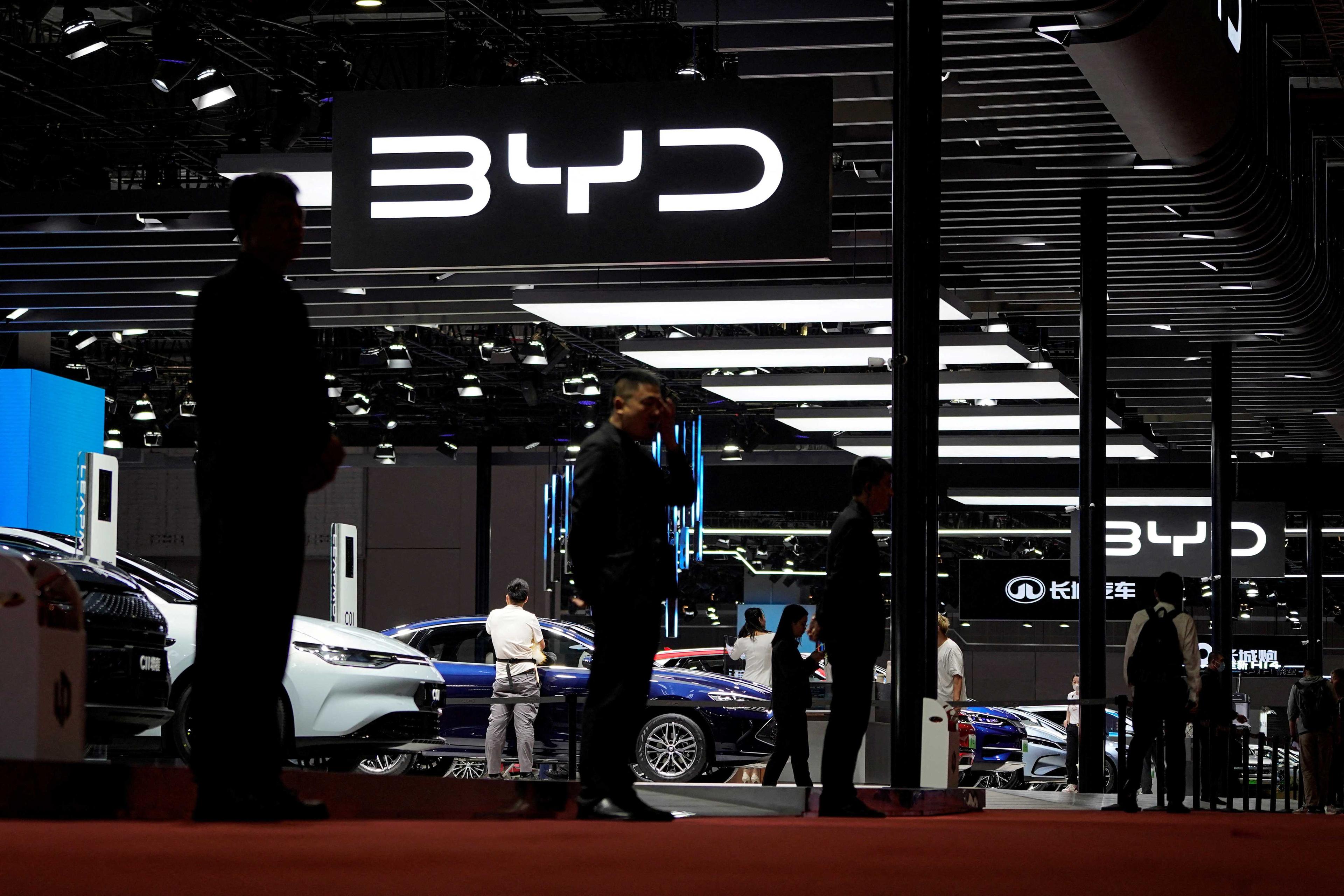 Security guards stand at the BYD booth at the Auto Shanghai show, in Shanghai, China April 19. Photo: Reuters