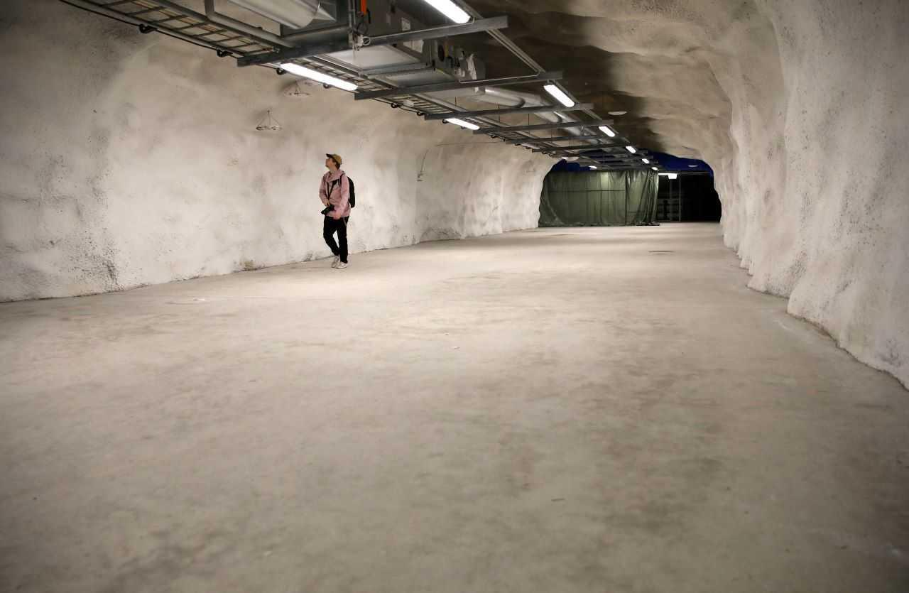 A member of the media walks inside a civil defence underground shelter, used also as a sports hall, in Helsinki, Finland, May 25, 2022. Photo: Reuters