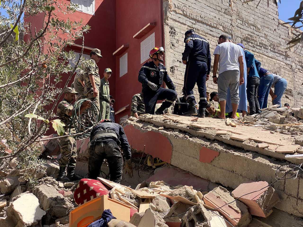 Rescuers search for survivors following a powerful earthquake, in Amizmiz, in Morocco, Sept 9. Photo: Reuters