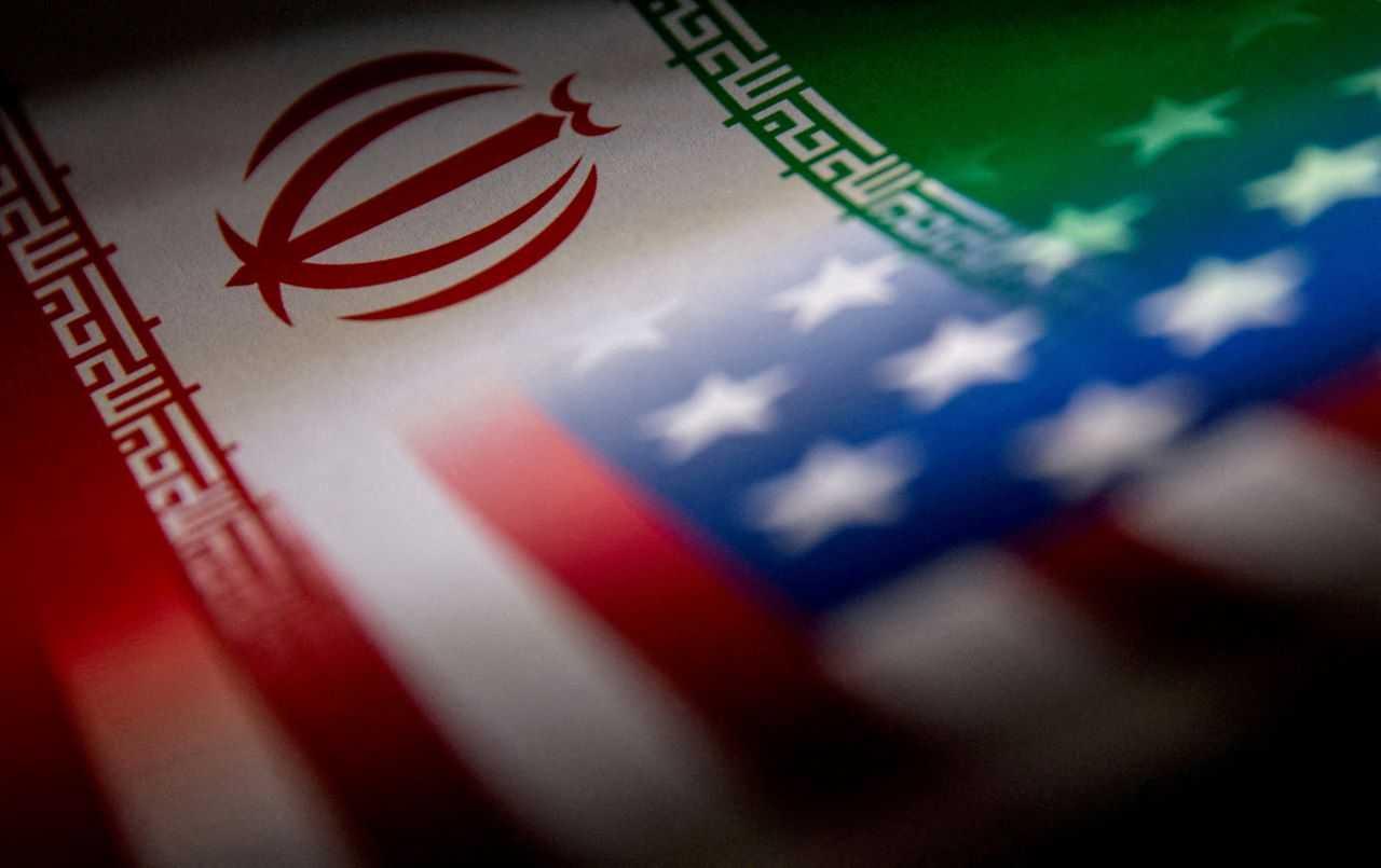 The Iranian and US flags are seen printed on paper in this illustration taken Jan 27, 2022. Photo: Reuters
