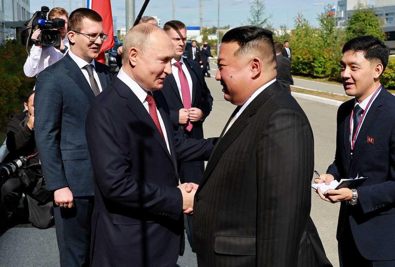 Russia's President Vladimir Putin shakes hands with North Korea's leader Kim Jong Un during a meeting at the Vostochny Сosmodrome in the far eastern Amur region, Russia, Sept 13. Photo: Reuters