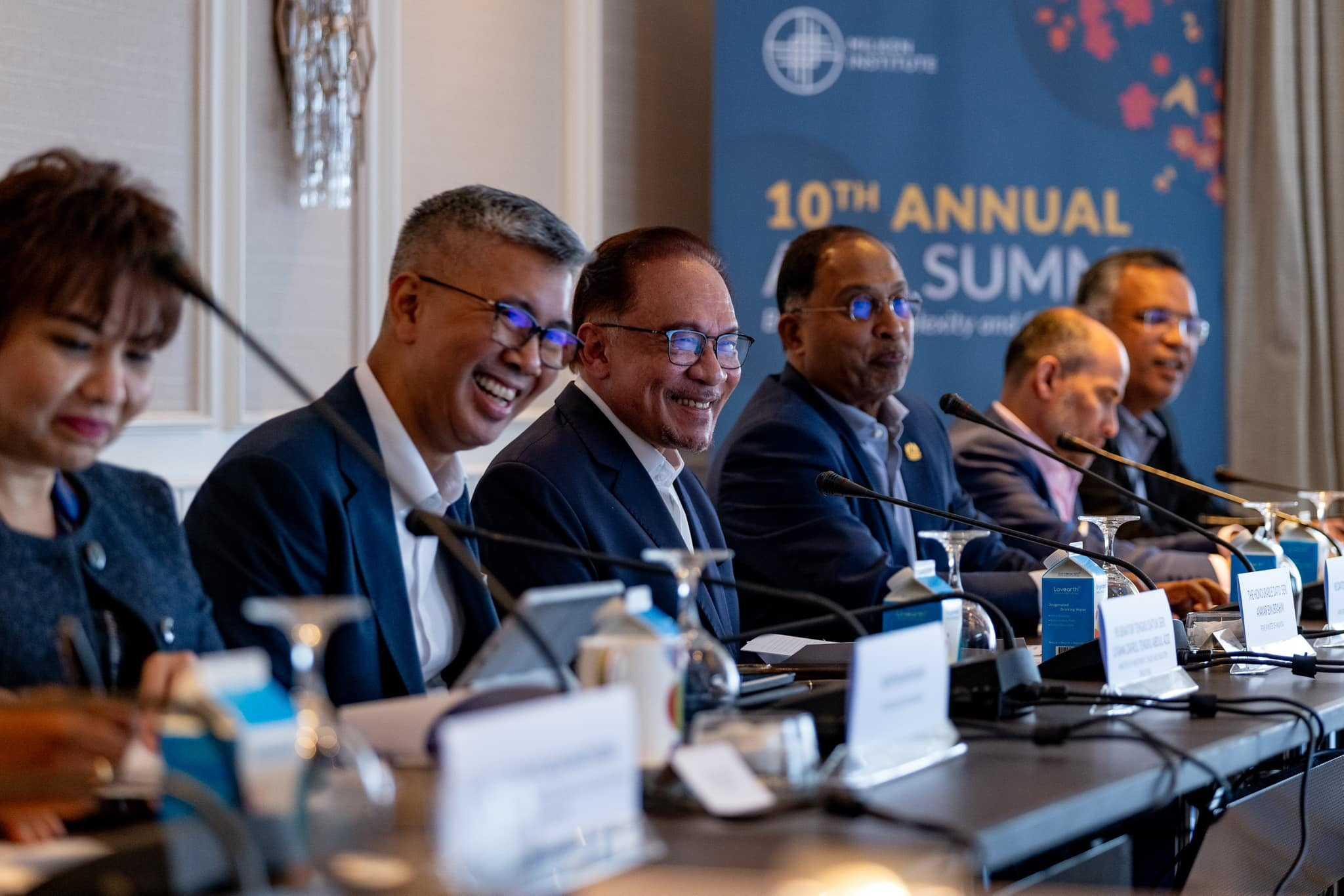 Prime Minister Anwar Ibrahim with International Trade and Industry Minister Tengku Zafrul Tengku Aziz at a session in conjunction with the Milken Institute 10th Annual Asia Summit in Singapore. Photo: Facebook