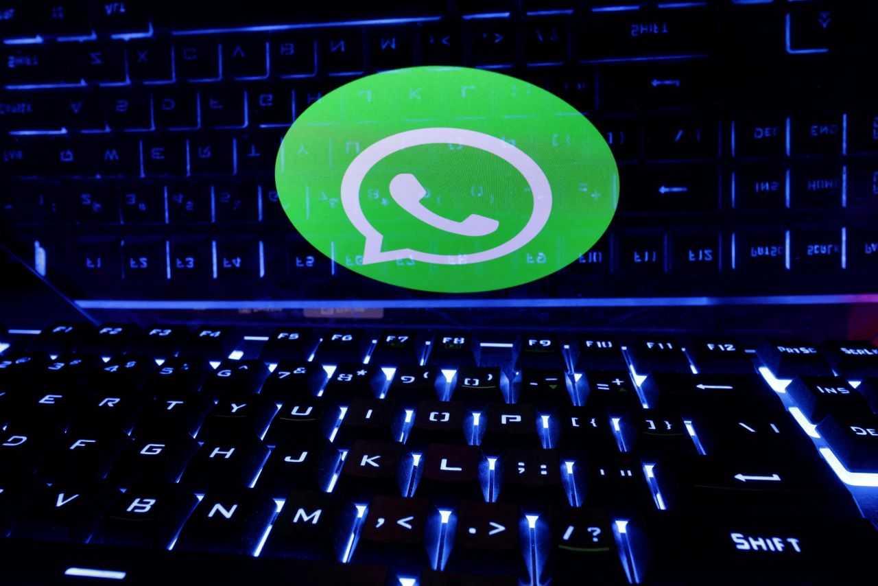 A keyboard is placed in front of a displayed WhatsApp logo in this illustration taken Feb 21. Photo: Reuters