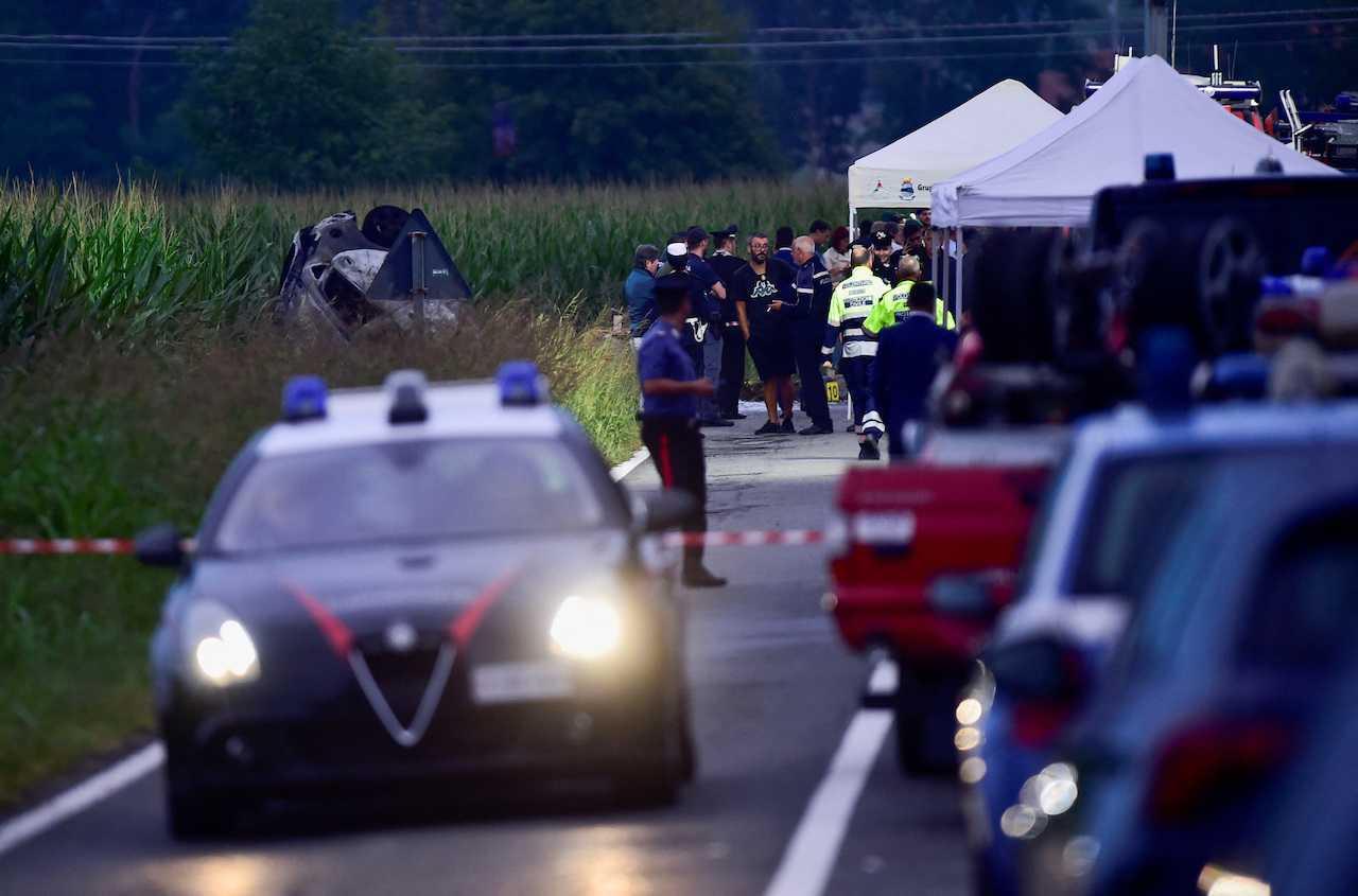 Emergency personnel work at the scene of a jet crash during an exercise in San Francesco al Campo, near Turin, Italy, Sept 16. Photo: Reuters
