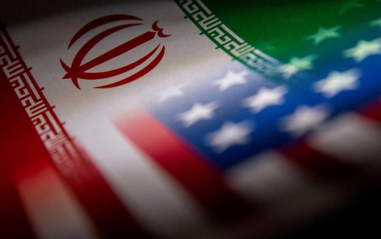 Iran's and US' flags are seen printed on paper in this illustration taken Jan 27, 2022. Photo: Reuters
