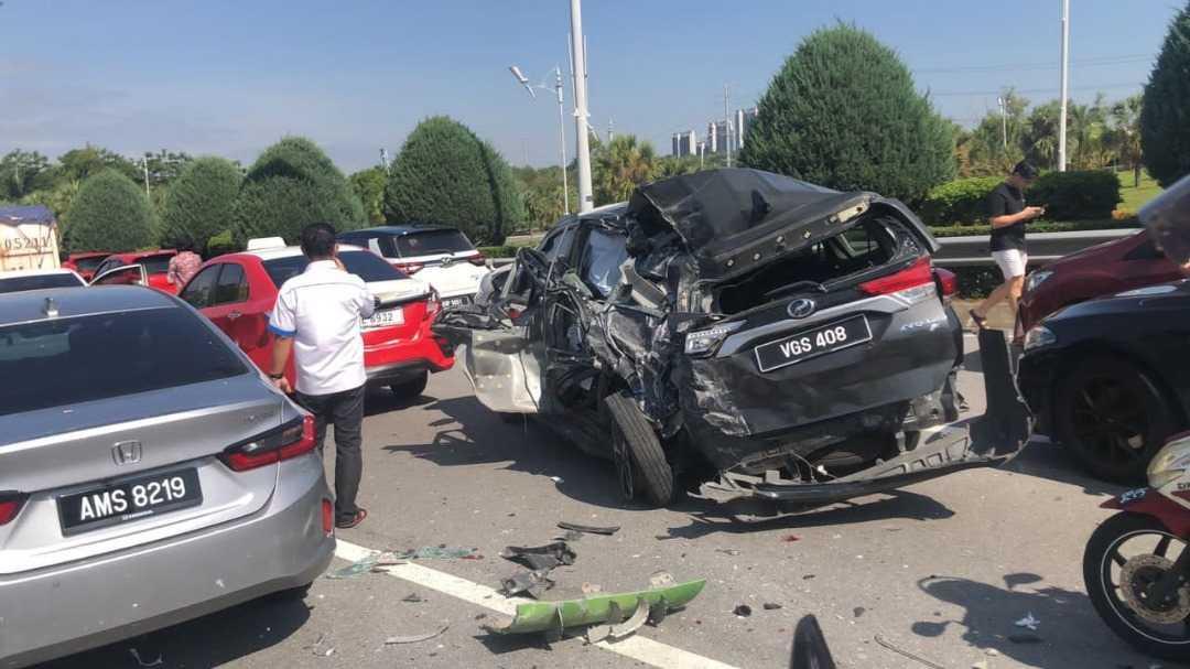 Police say the lorry was changing lanes and crashed into six cars, two lorries, three motorcycles, and a police outrider's motorcycle. Photo: Facebook