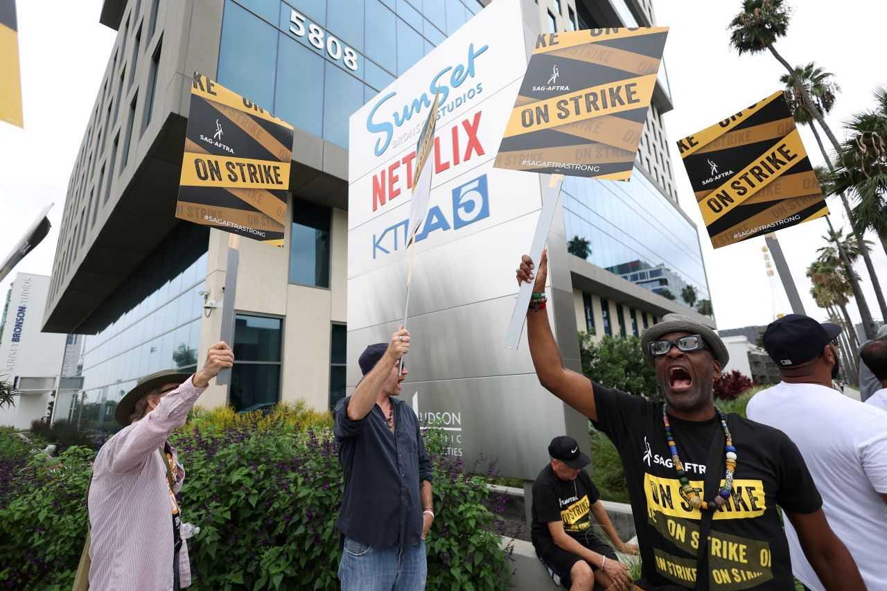 SAG-AFTRA actors and Writers Guild of America (WGA) writers walk the picket line during their ongoing strike outside Netflix offices in Los Angeles, California, US, Sept 5. Photo: Reuters