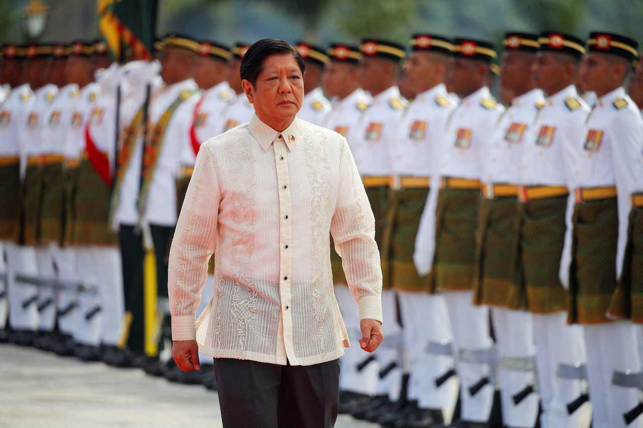 Philippine President Ferdinand Marcos Jr inspects the guard of honour during a state welcome ceremony at Istana Negara in Kuala Lumpur, July 26. Photo: Reuters