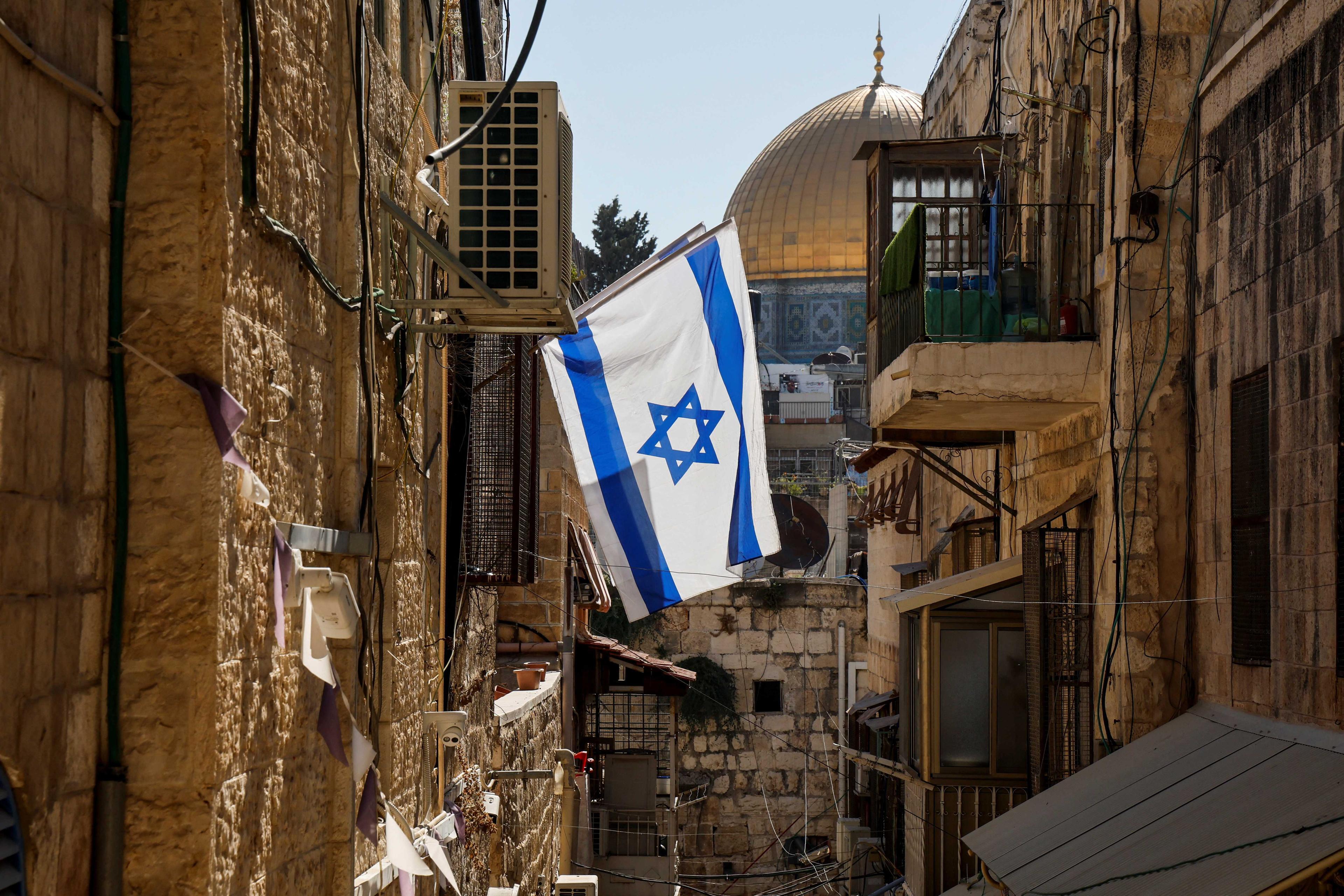 An Israeli flag is seen near the Dome of the Rock in Jerusalem's Old City, July 23. Photo: Reuters
