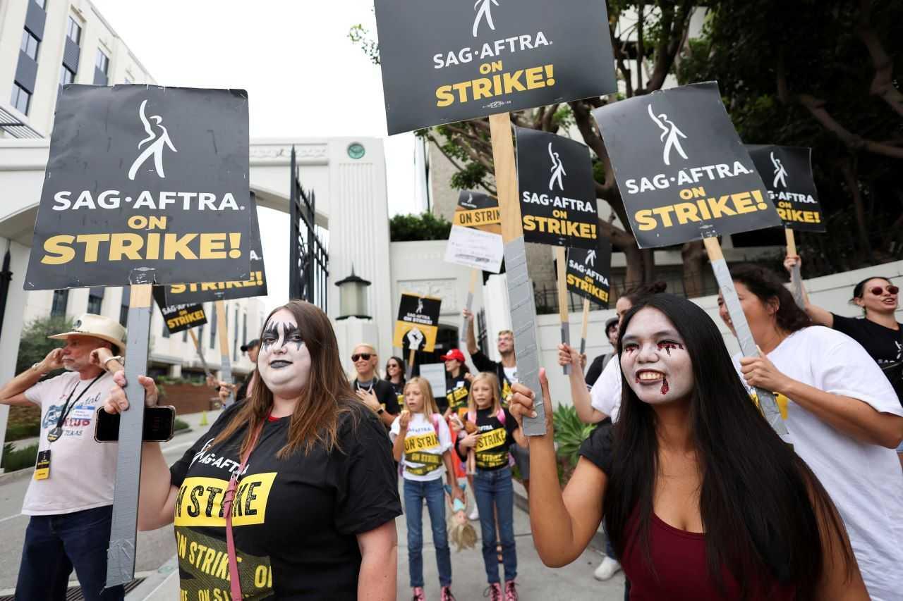 SAG-AFTRA members walk the picket line during their ongoing strike outside Sony Studios in Culver City, California, US Sept 29. Photo: Reuters