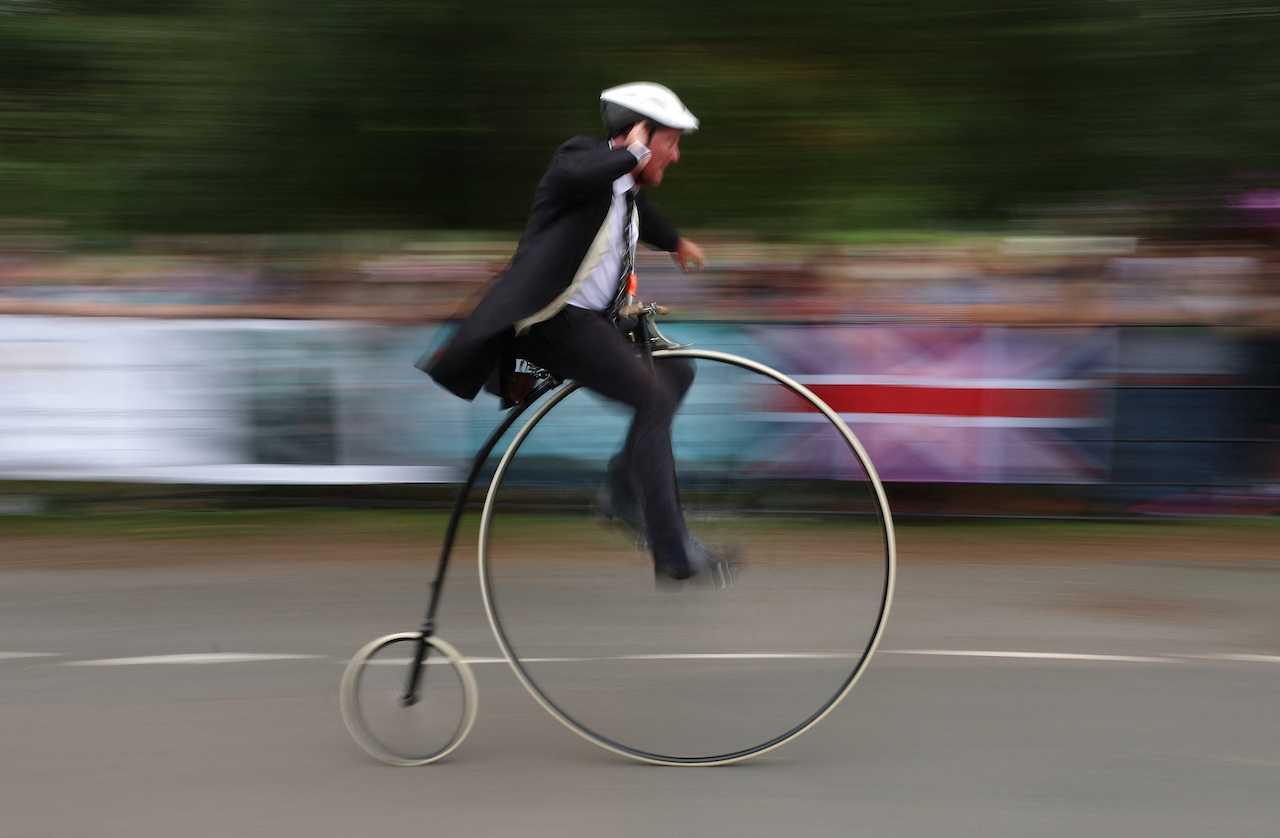 A rider is seen during the Knutsford great race, a penny farthing race around the village in Britain that takes place every 10 years. Photo: Reuters
