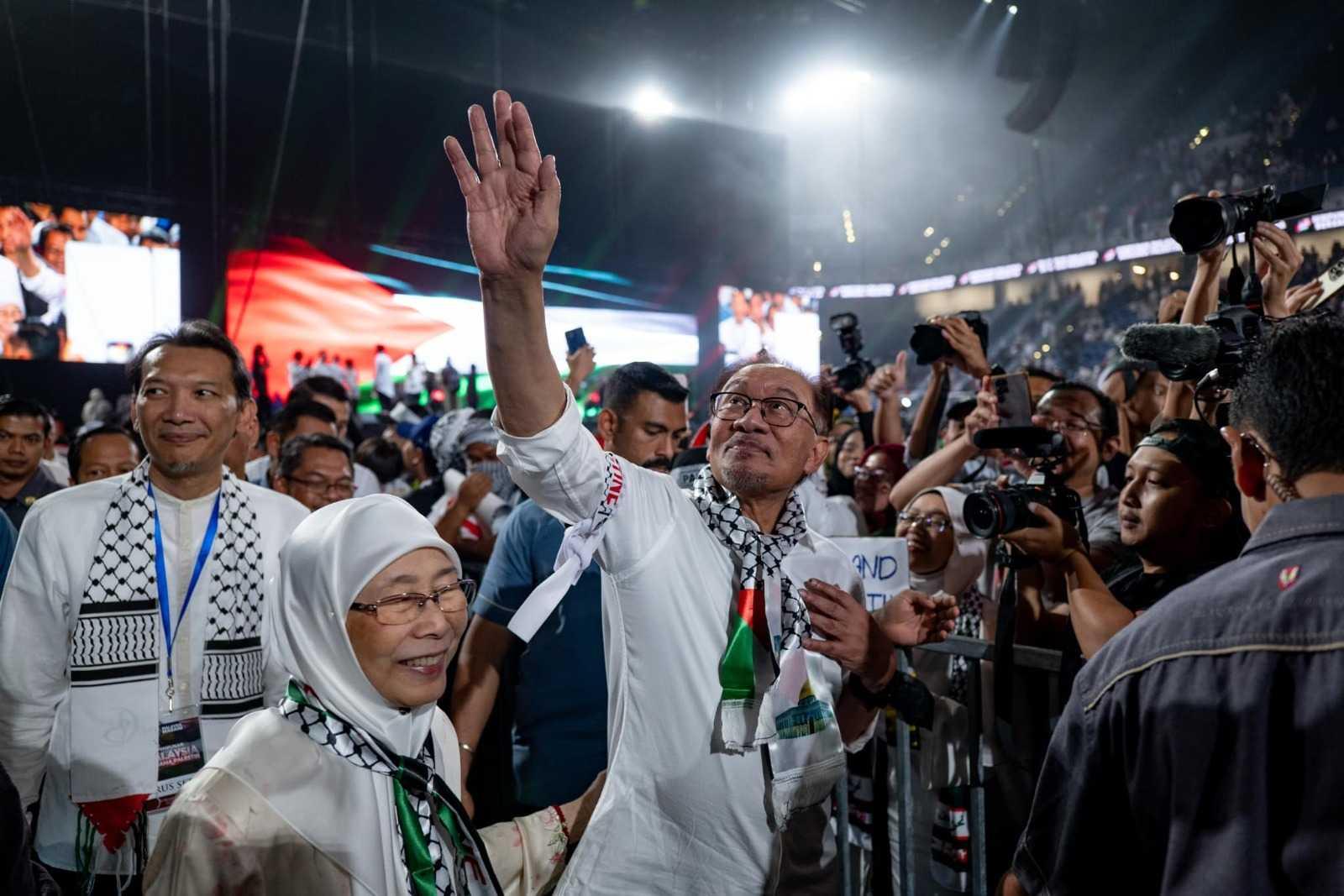Prime Minister Anwar Ibrahim and his wife, Dr Wan Azizah Wan Ismail, at a closed-door event in support of Palestine on Tuesday.