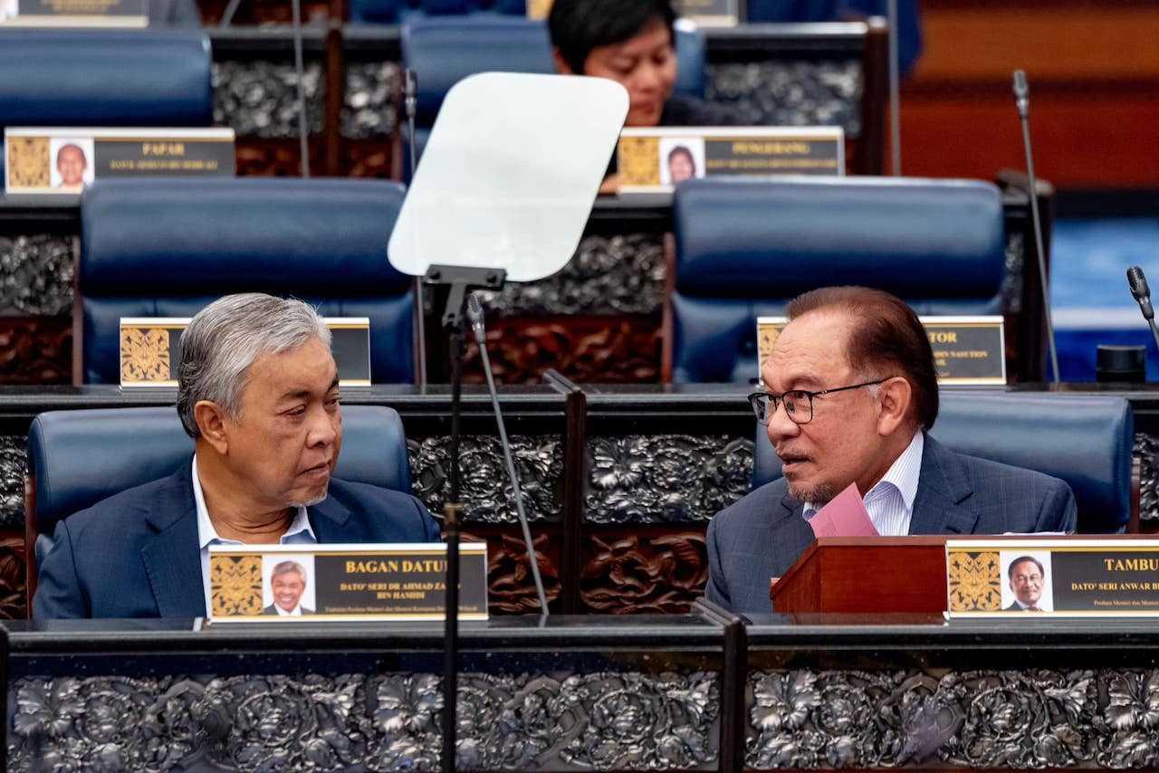 Anwar Ibrahim joined hands with Umno president Ahmad Zahid Hamidi to form a 'unity government' which they said would restore political stability. Photo: Facebook
