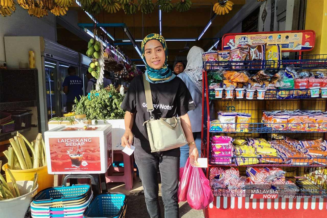 Musdana Musthafa, who works in the private sector, gets her groceries from the sundry shops around her neighbourhood. Although these can sometimes cost more, she has no choice as such shops are the closest at hand.