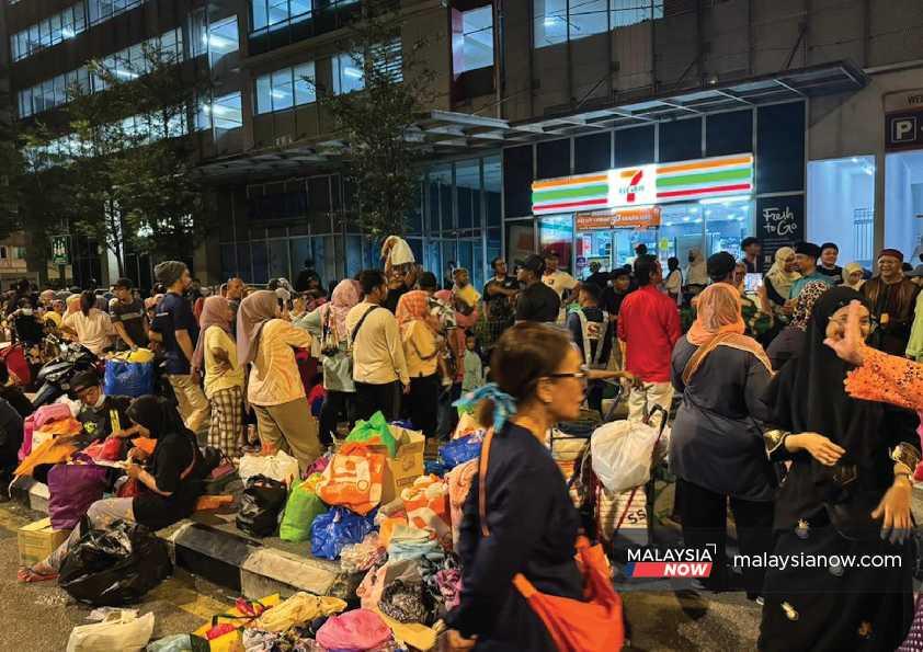 Crowd at the weekly aid distribution programme in Chow Kit conducted by Food for Gelandangan on March 29, 2024. There has been an increase in the number of people seeking help this year.