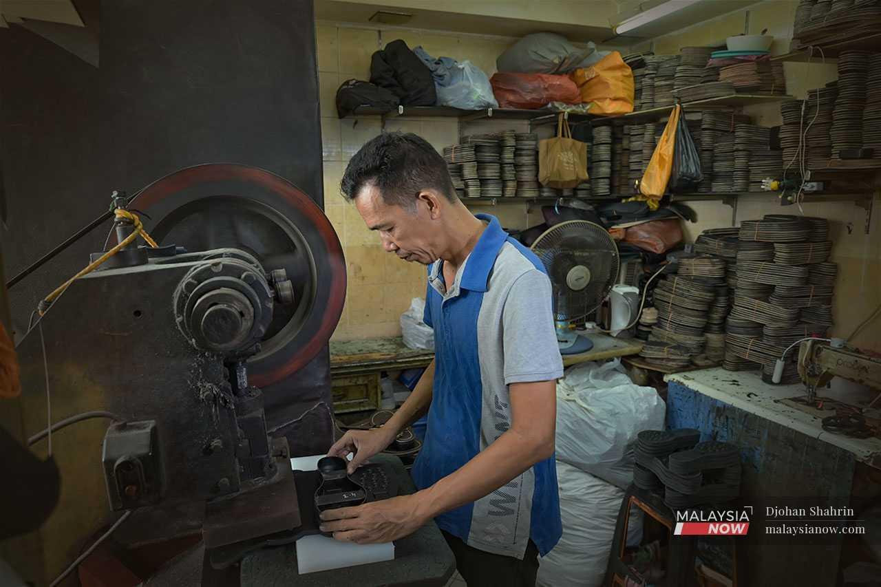 Irwan Shah Mansor Din is a sandal maker who has been in the business for 15 years.