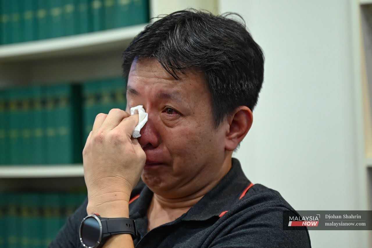Grab driver Ong Ing Keong tears up during a press conference by Lawyers for Liberty on Aug 14 as he recalls how he was assaulted by an officer accompanying a royal entourage.
