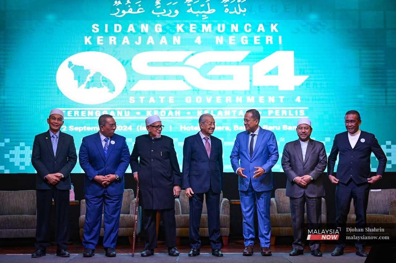 Menteri besars representing SG4 and other Perikatan Nasional leaders join Dr Mahathir Mohamad (centre) during the grouping's recent summit in Bangi, Selangor.
