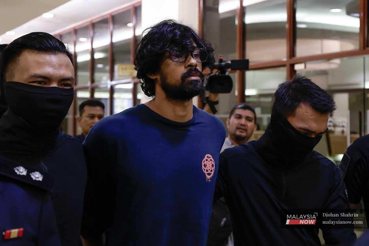 Yusoff Rawther has lodged two police reports alleging that the guns and drugs found in his car were planted by his enemies.