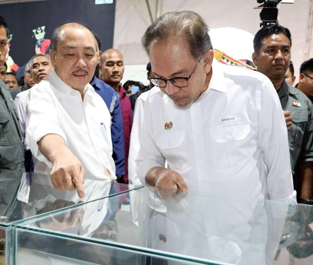 Sabah Chief Minister Hajiji Noor seen here with Prime Minister Anwar Ibrahim. The former Bersatu man has managed to remain in power amid pressure from state Umno leaders.