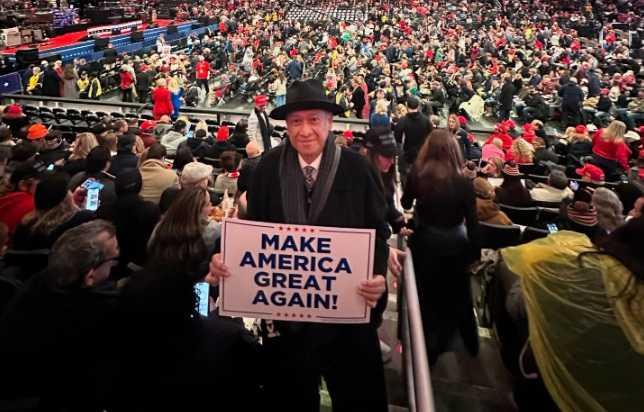 Nazri Aziz proudly holds the MAGA sign at Donald Trump's victory rally in Washington last month.