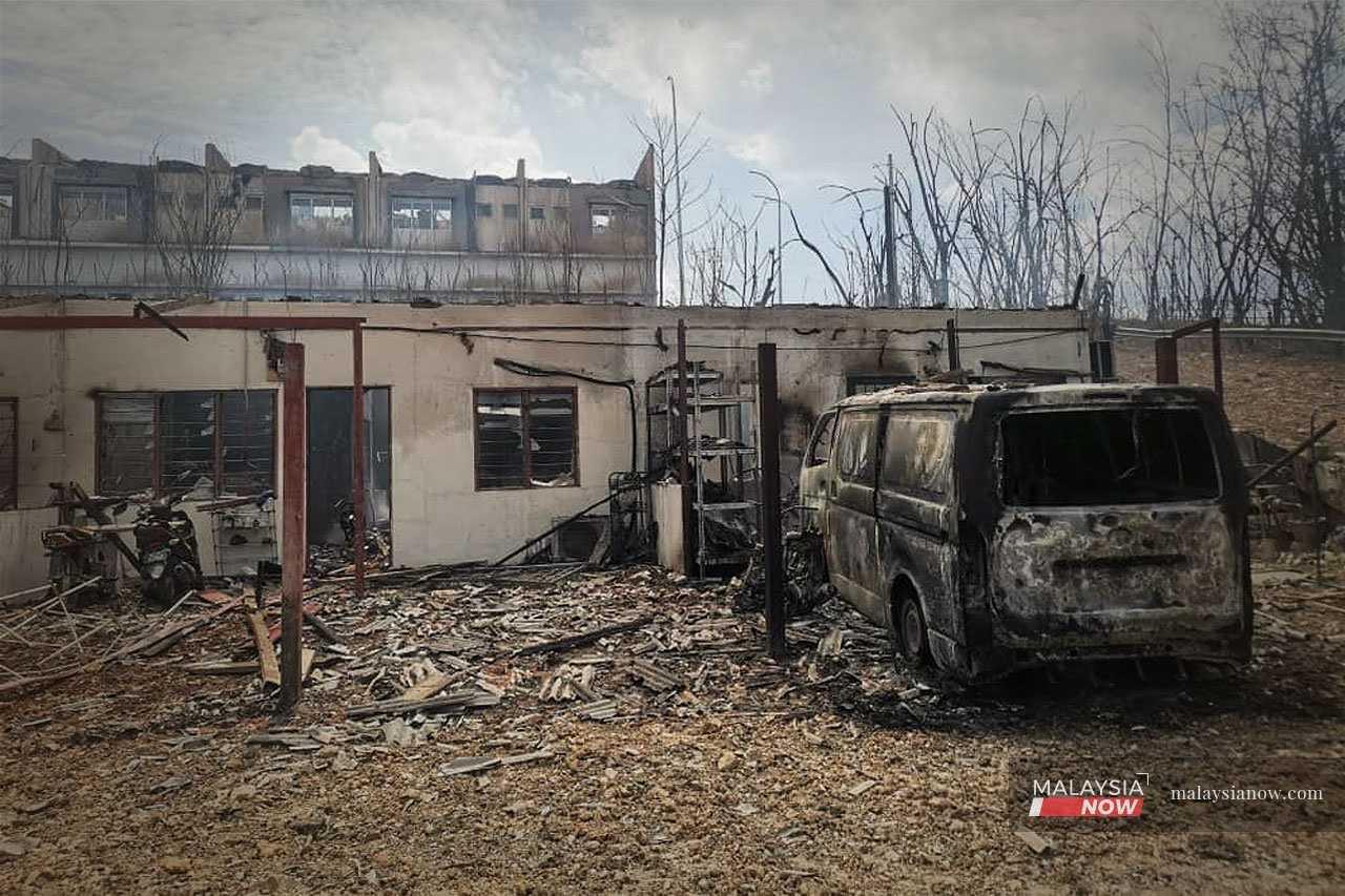A van parked at a house in Kampung Kuala Sungai Baru is among some 400 vehicles destroyed in the massive gas pipeline fire in Putra Heights on April 1, 2025.