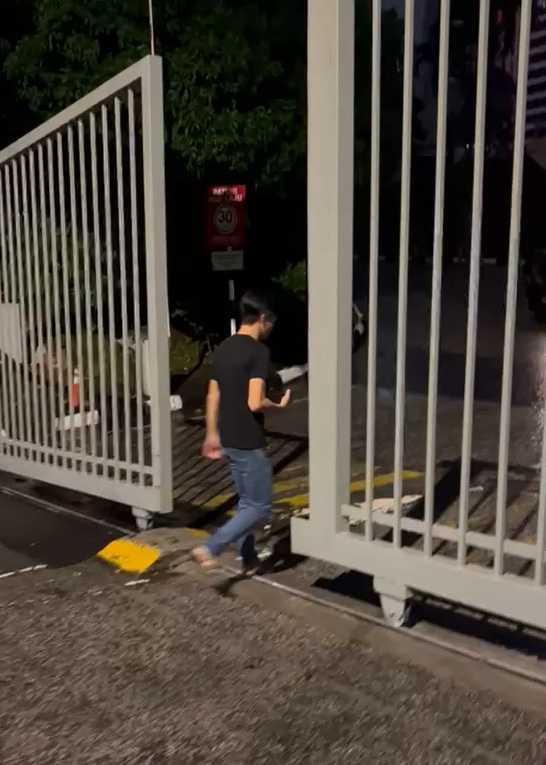 An employee of LSH Capital seen entering the KL Tower premises after it was sealed by the government on April 16, 2025.